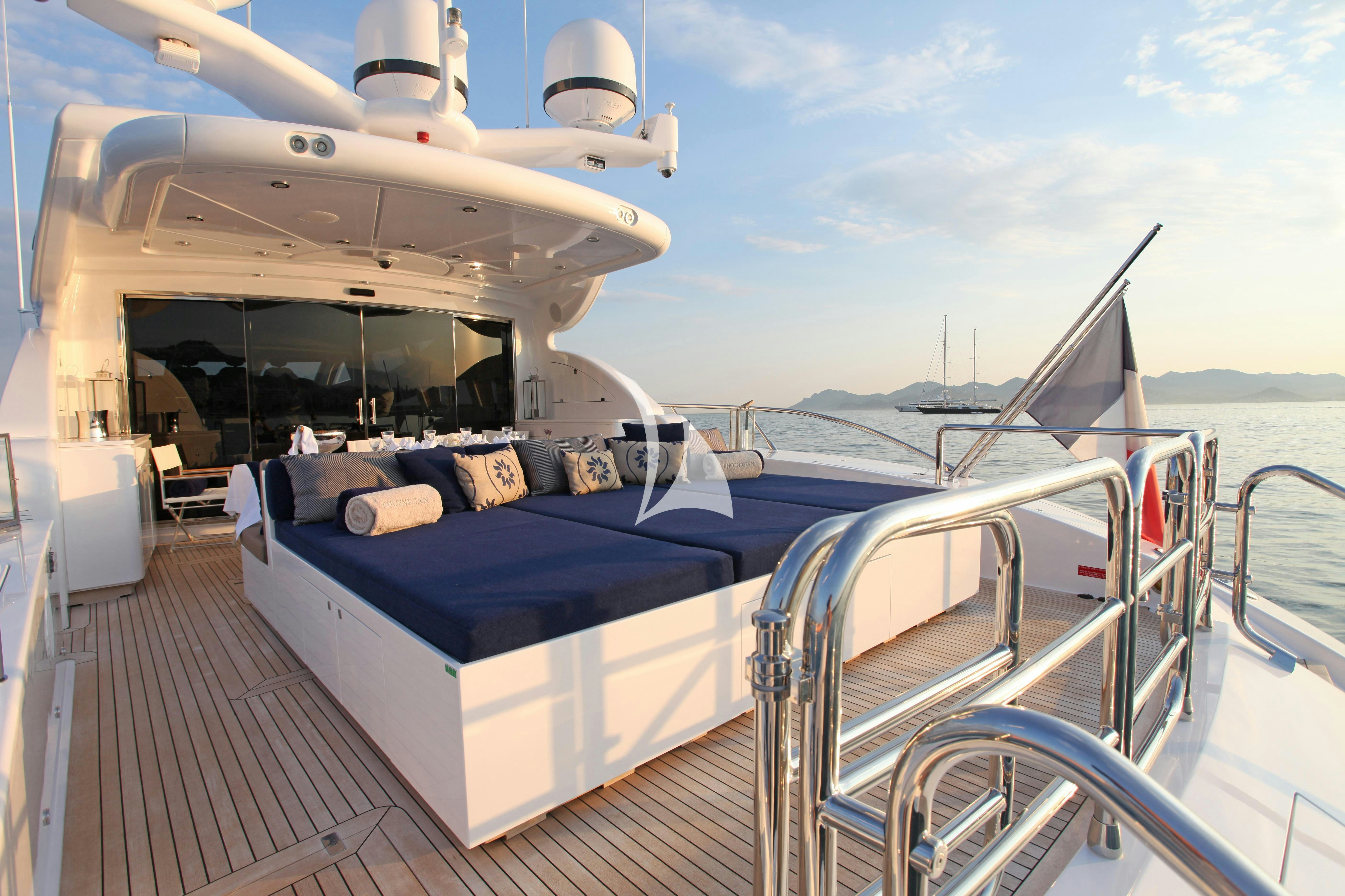 a boat on a deck aboard PHOENICIAN Yacht for Charter