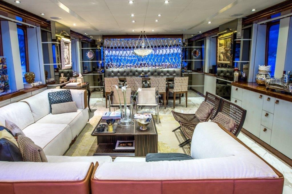 a living room with a large window aboard ZULU Yacht for Charter