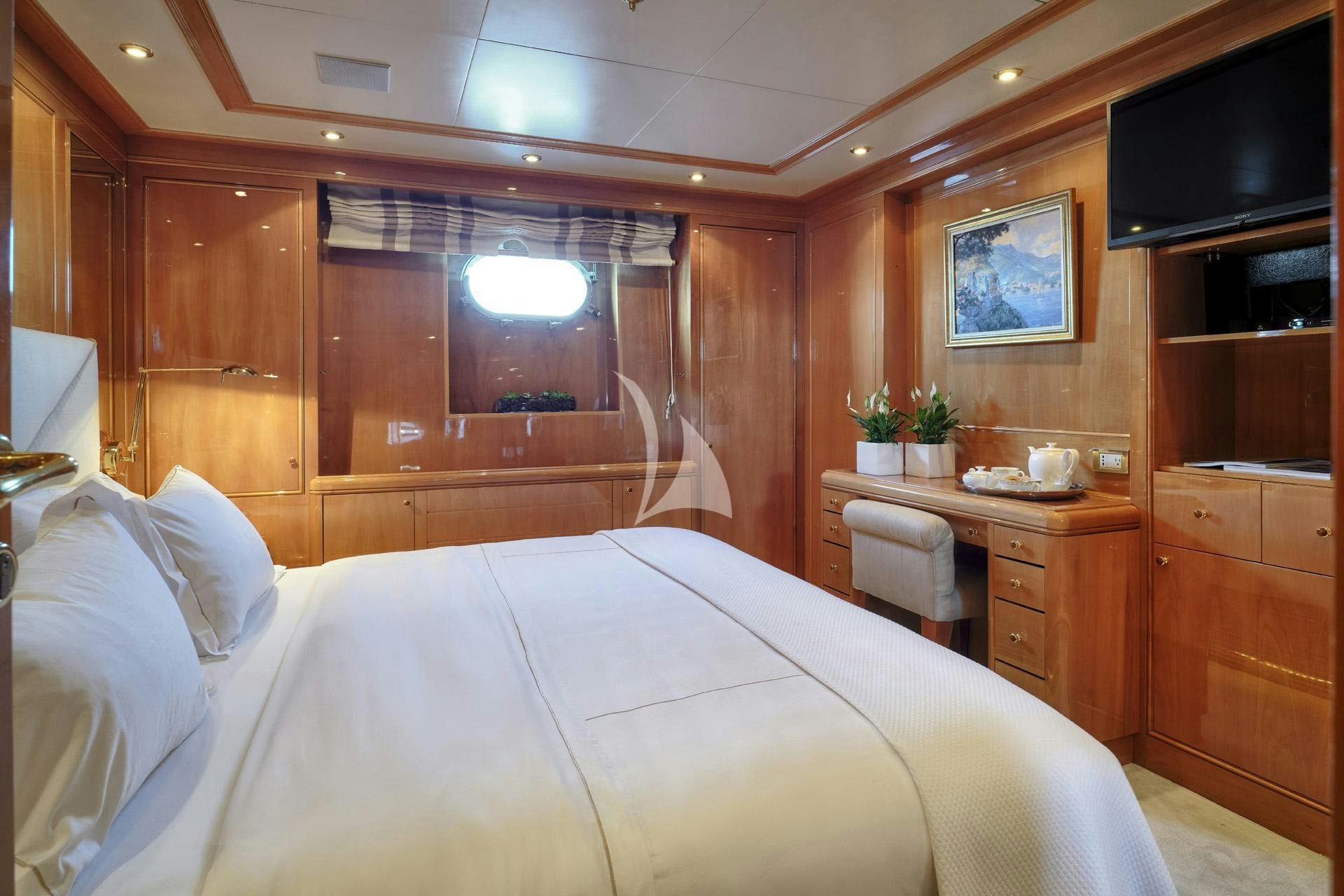 a bed in a room aboard ELENA V Yacht for Charter