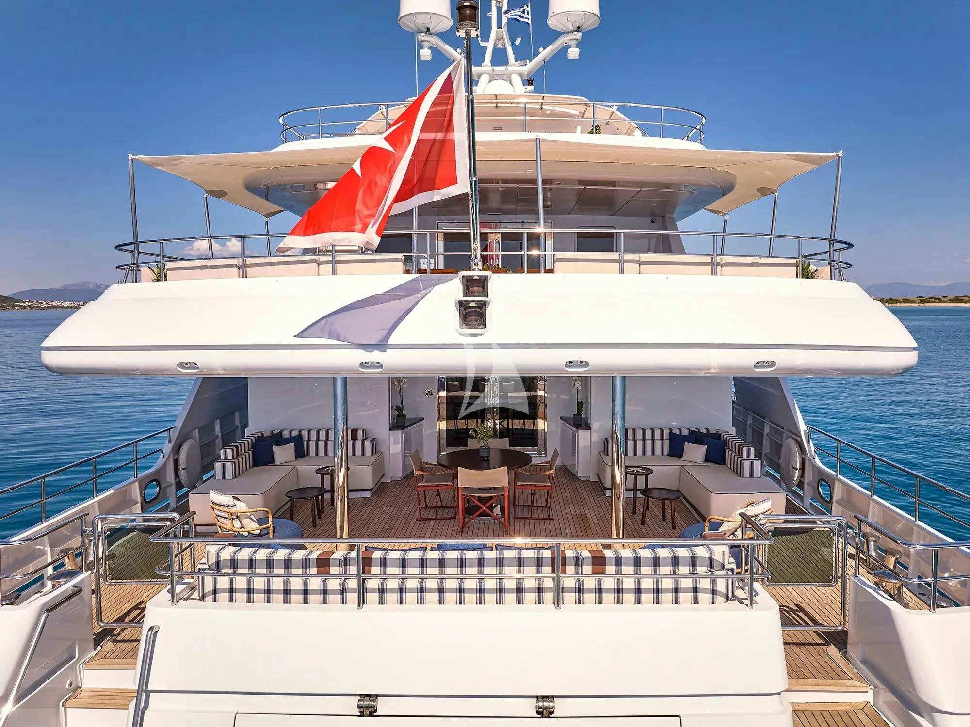 a large white ship docked aboard ELENA V Yacht for Charter