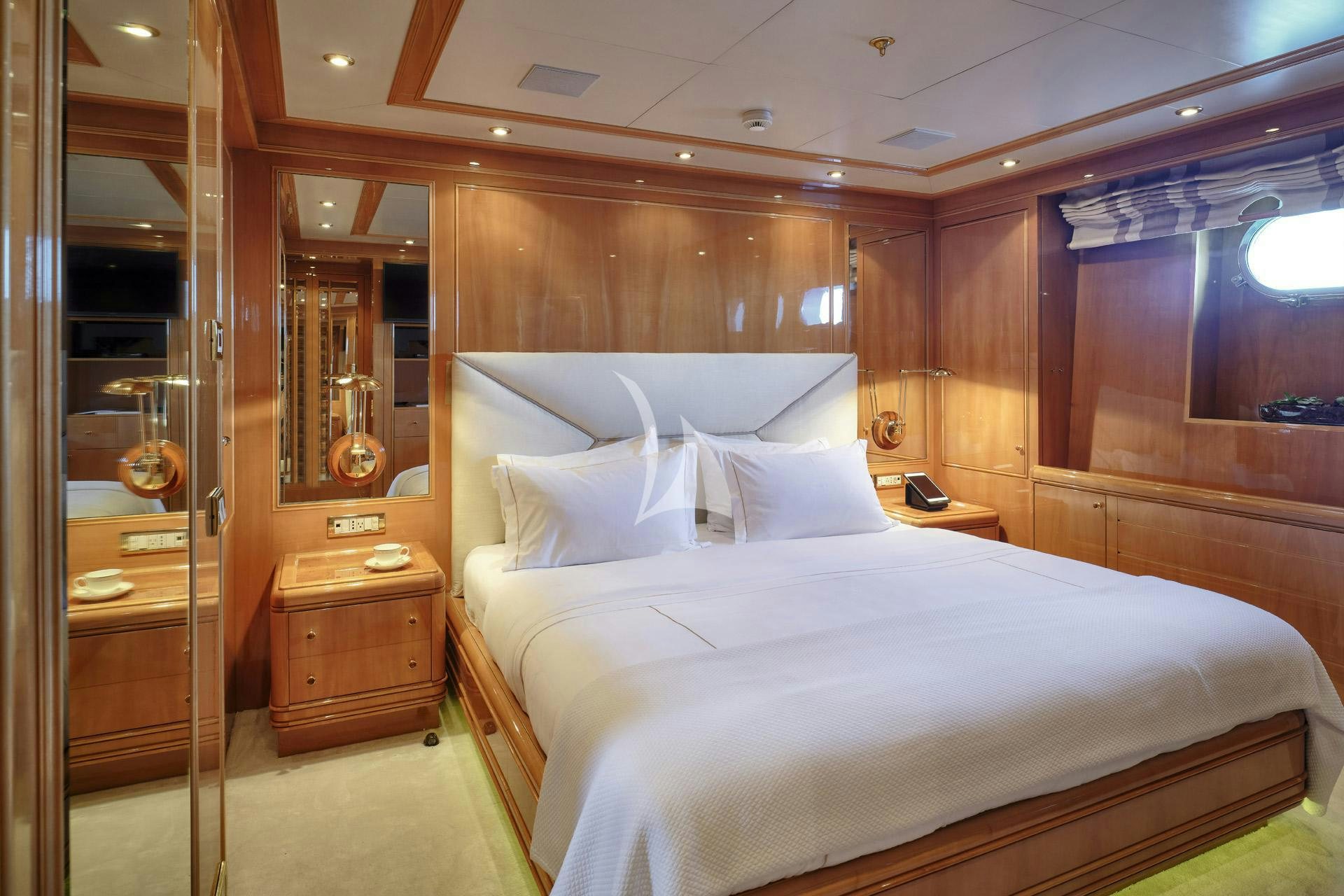 a bed in a room aboard ELENA V Yacht for Charter