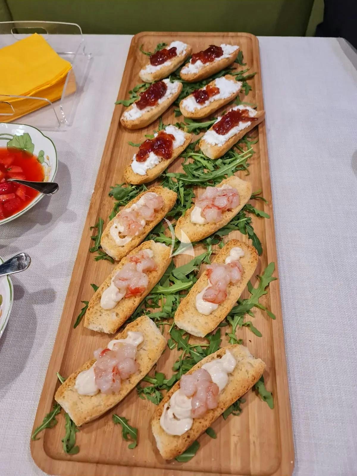 a plate of sushi aboard QUARTA SANTA MARIA Yacht for Sale