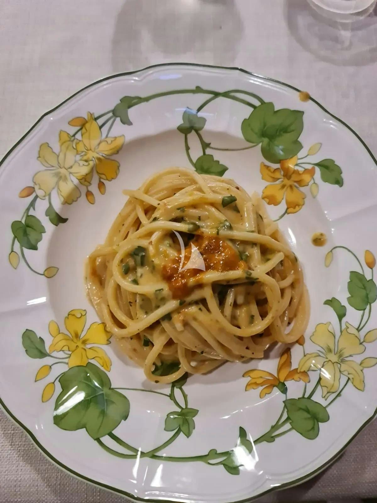 a bowl of pasta aboard QUARTA SANTA MARIA Yacht for Sale