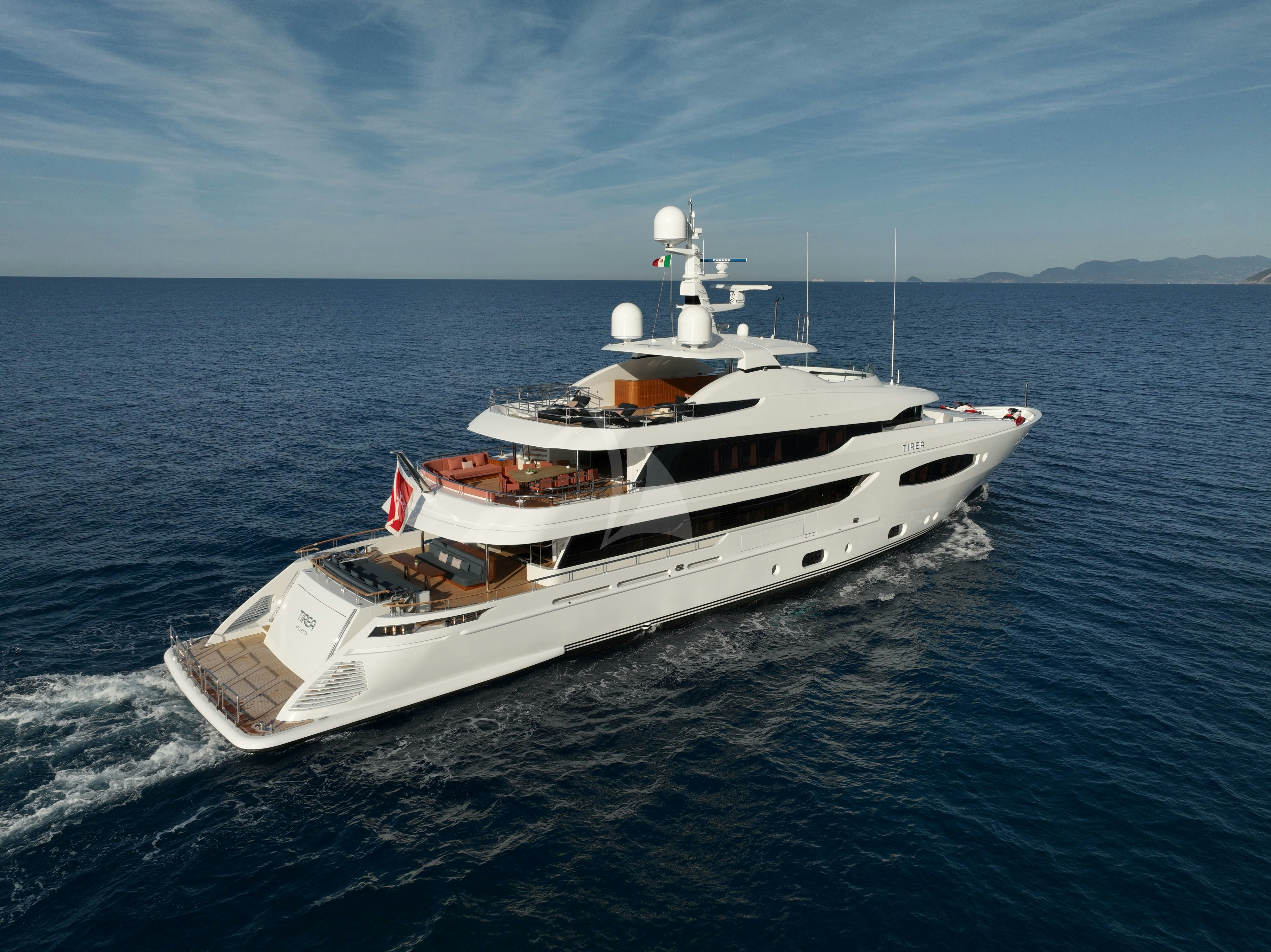 a white boat in the water aboard TIREA Yacht for Charter
