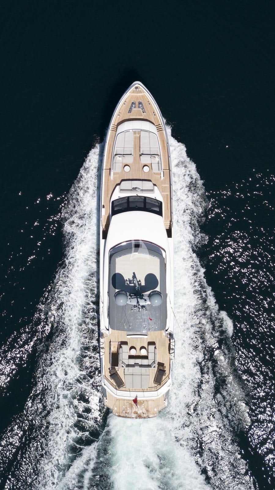 a white and black boat on water aboard ANTHEYA III Yacht for Charter