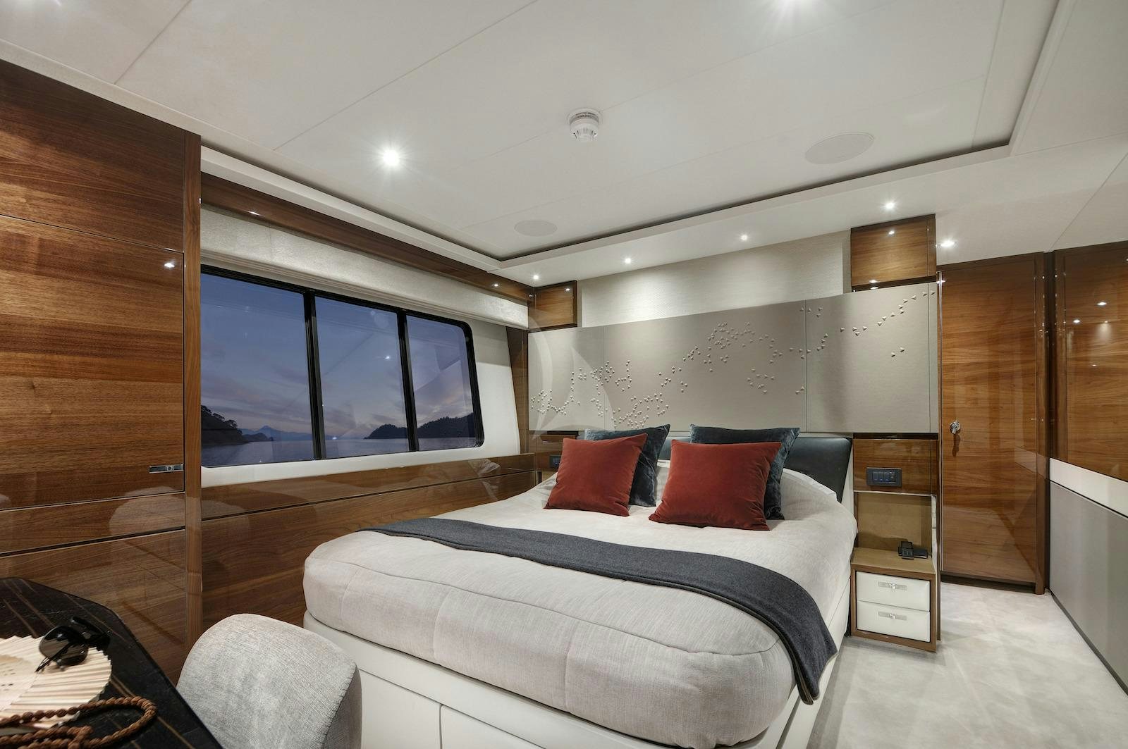 a bed in a room aboard ANTHEYA III Yacht for Charter