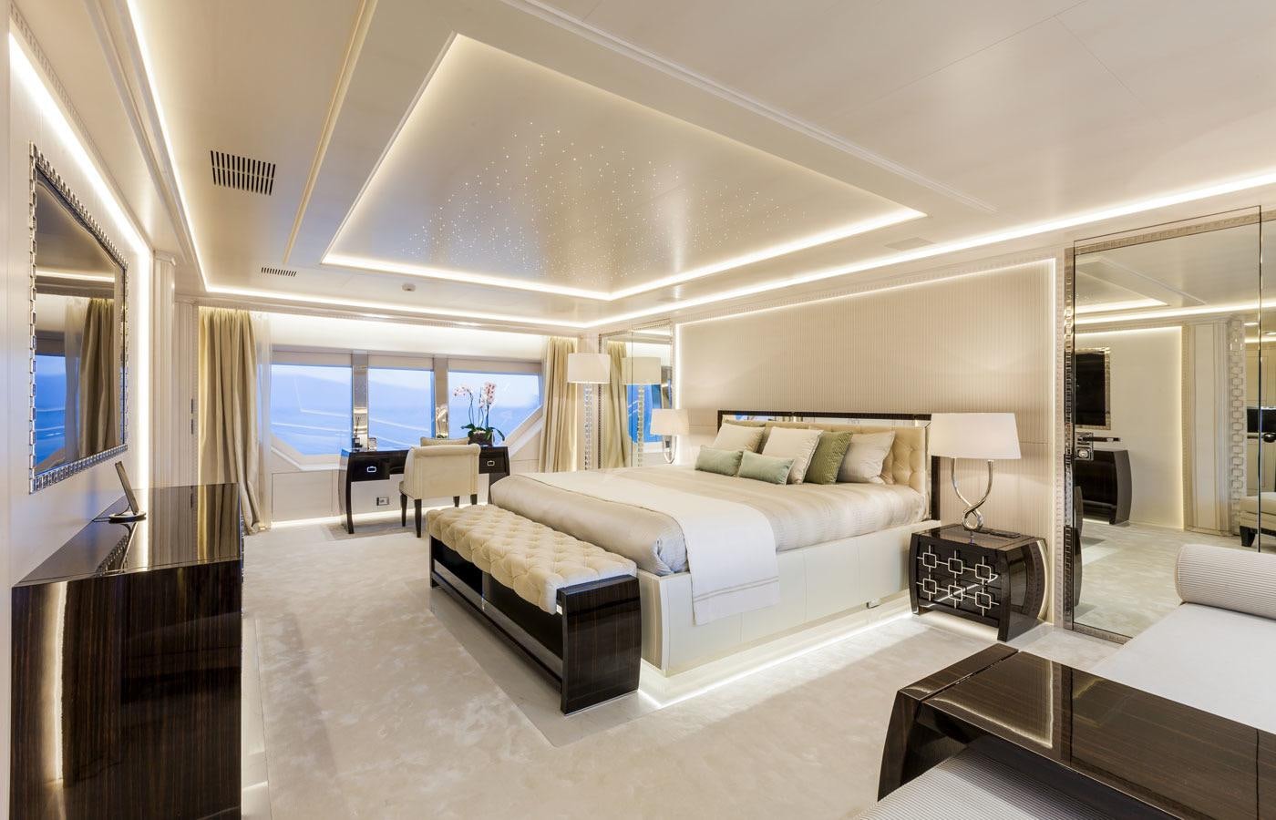 a living room with a large window aboard PARILLION Yacht for Charter