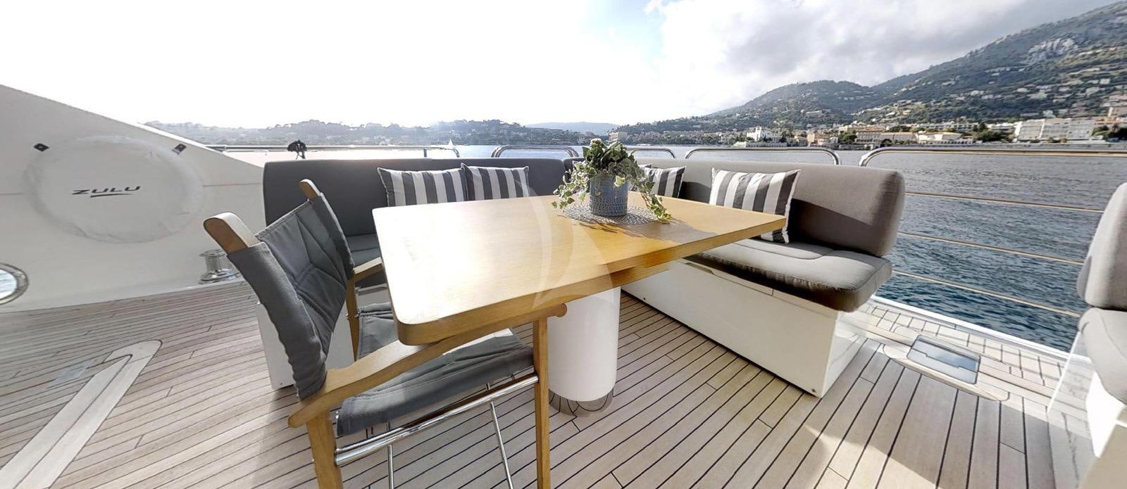 a table on a boat aboard EVEREAST Yacht for Charter