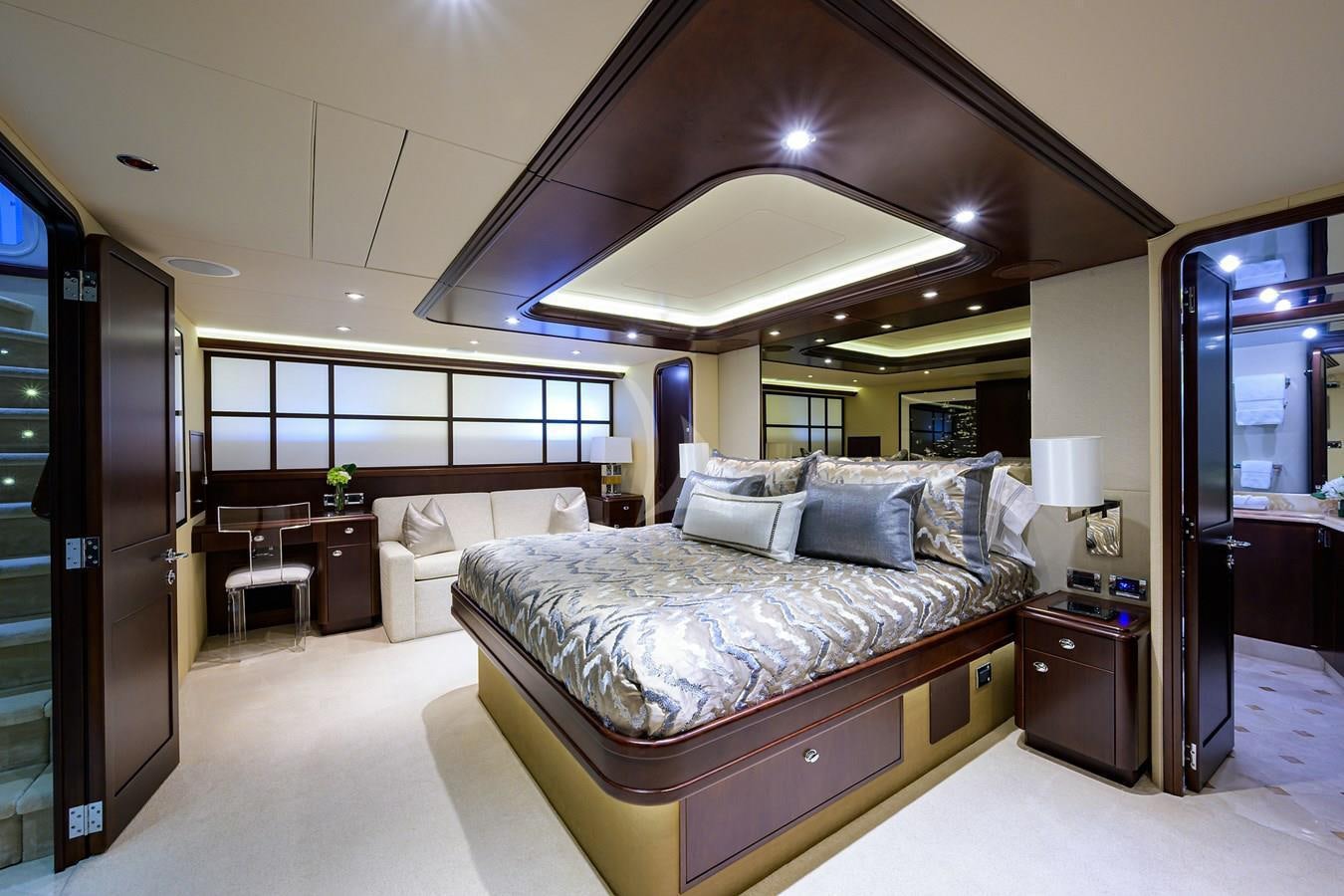 a large bedroom with a large bed aboard UNWINED Yacht for Charter