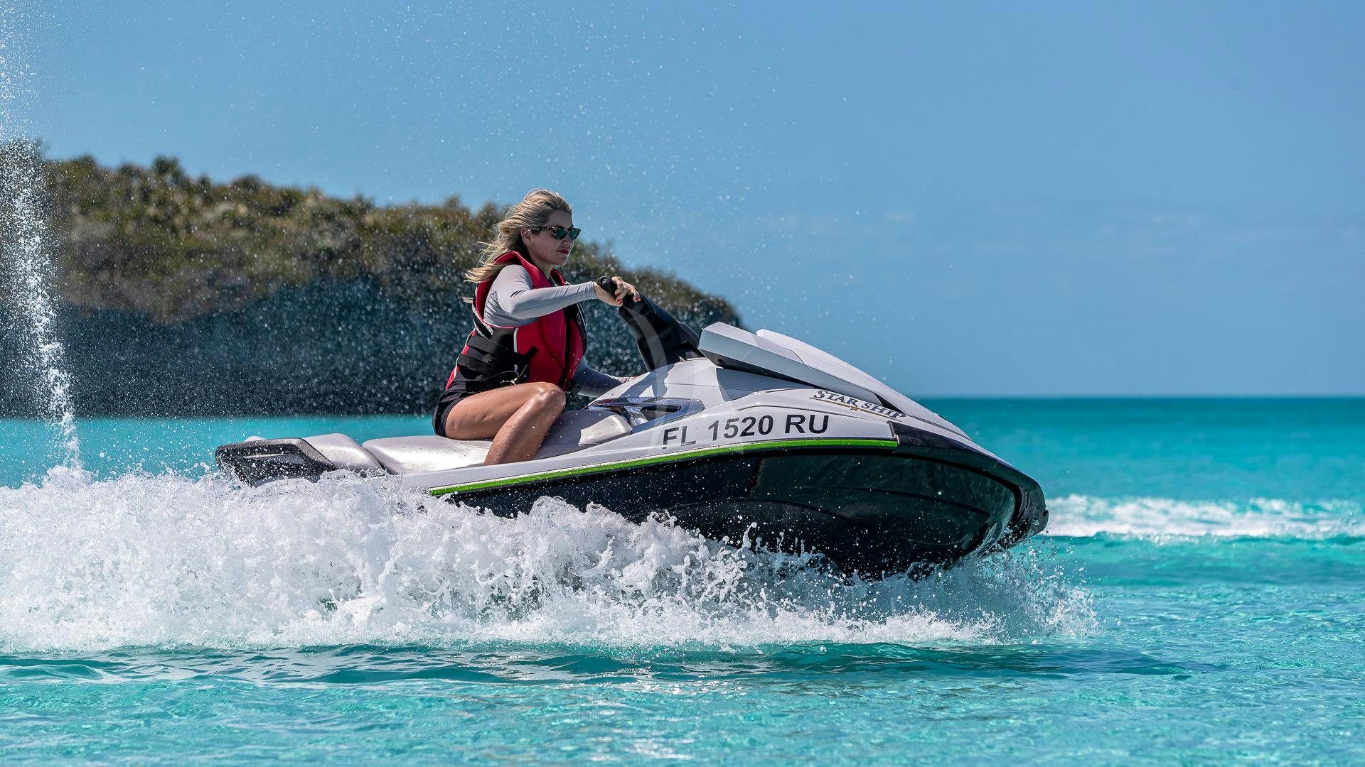 a man in a jet ski aboard STARSHIP Yacht for Charter