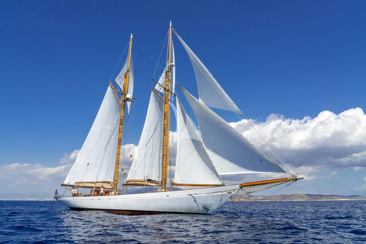 a sailboat in the water aboard AELLO Yacht for Charter
