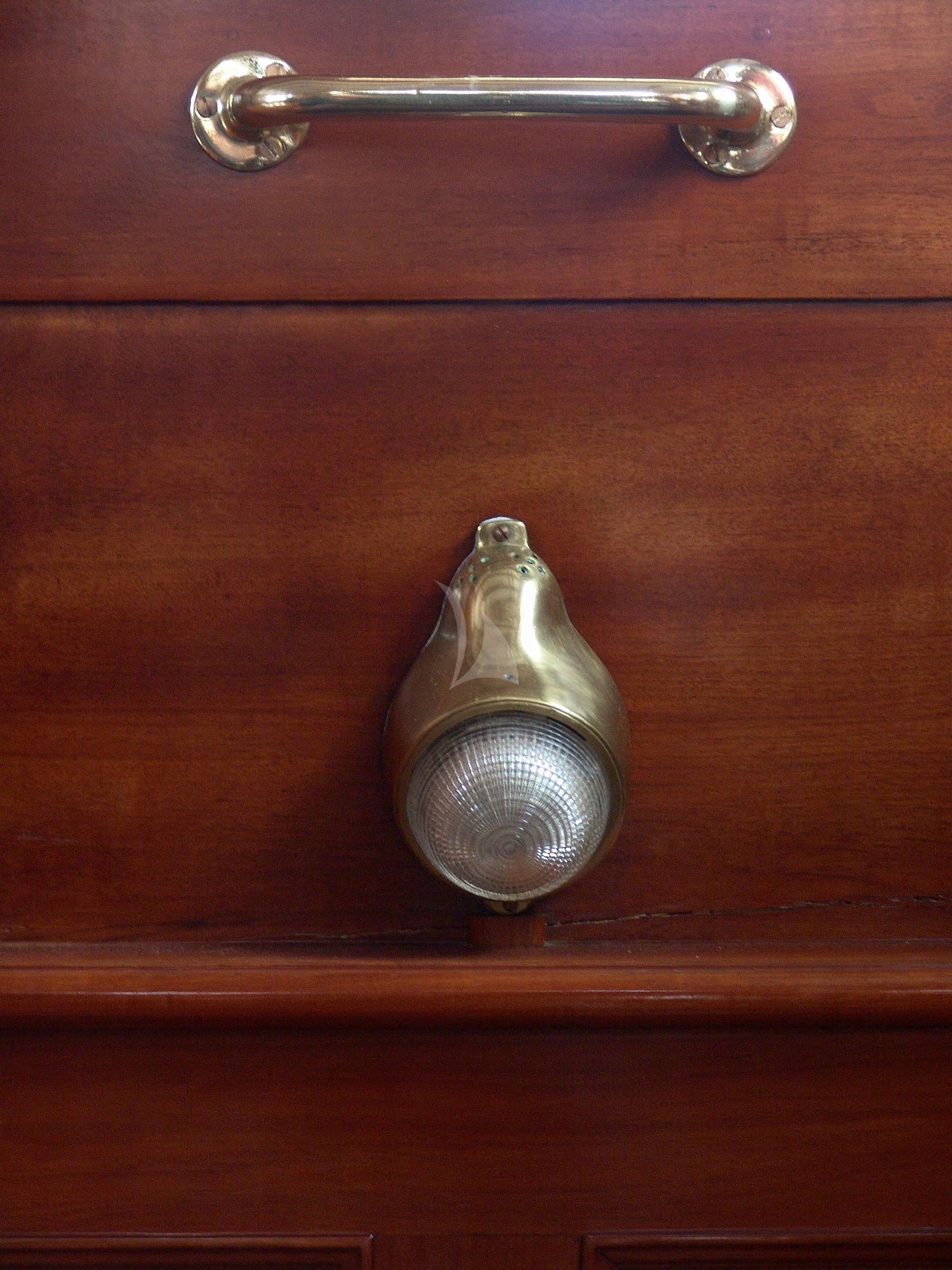 a silver door handle aboard AELLO Yacht for Charter