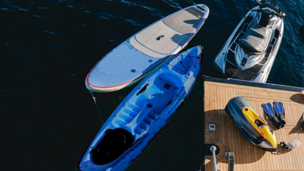 a couple of surfboards on a boat aboard LIFE IS GOOD Yacht for Charter