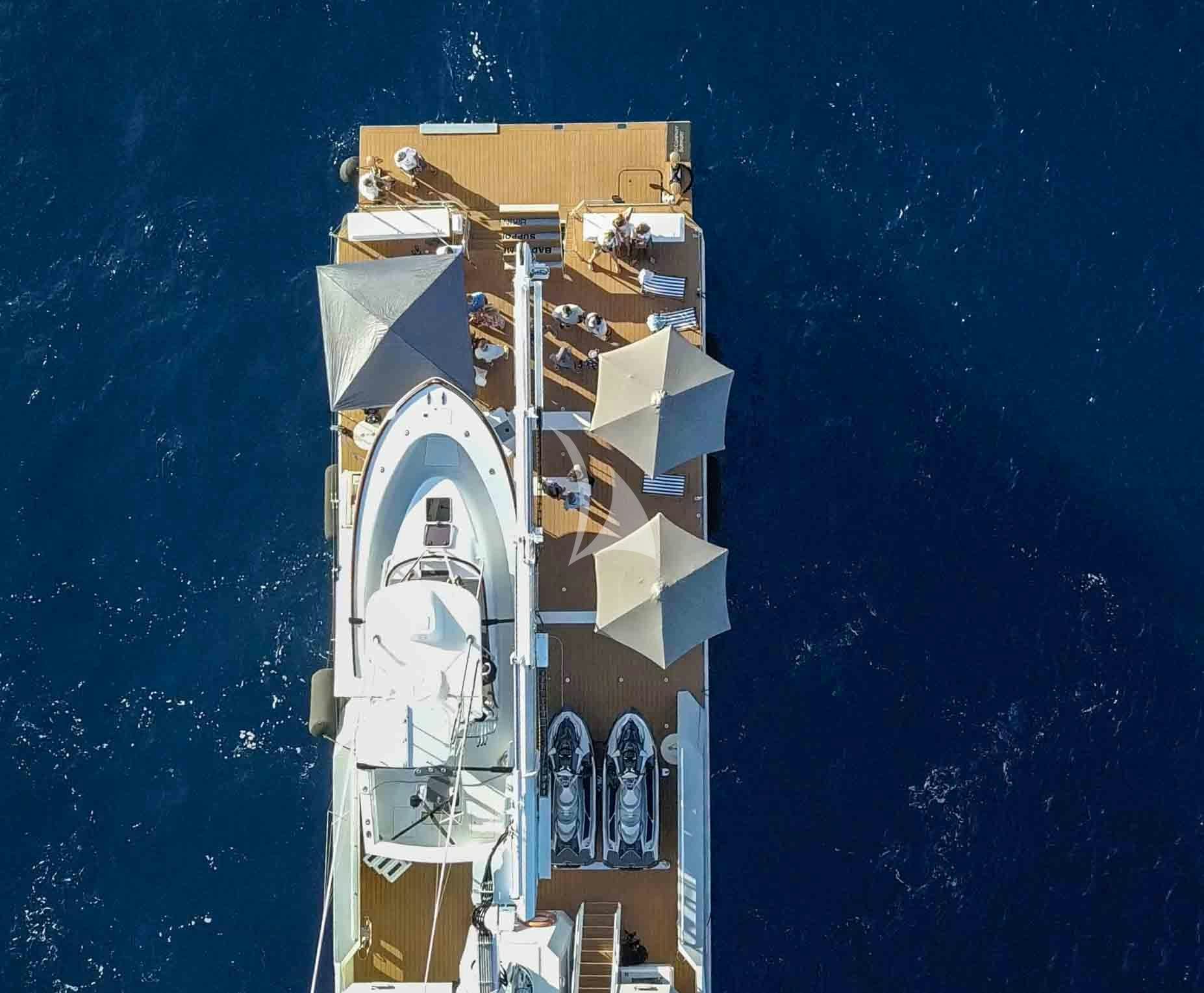 a building with a tower aboard BAD COMPANY SUPPORT Yacht for Charter