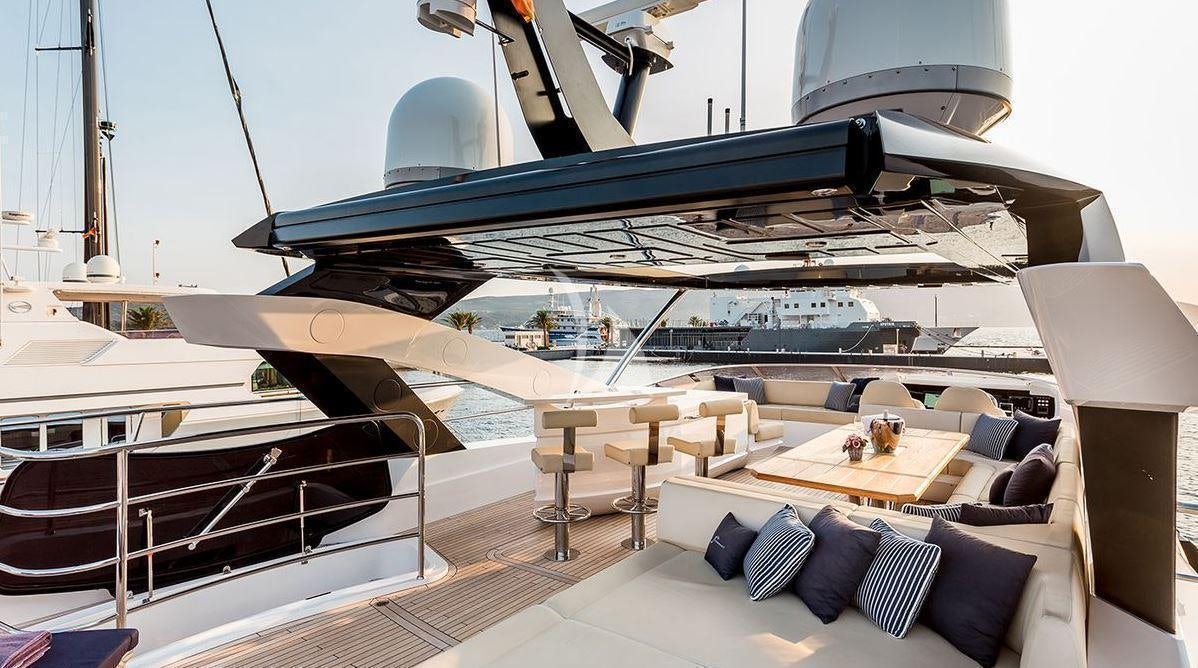 a large yacht with a lounge area aboard STARDUST OF MARY Yacht for Charter