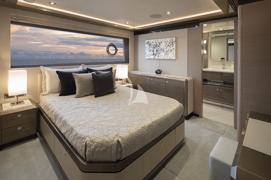 a large bed in a hotel room aboard ENTREPRENEUR Yacht for Charter