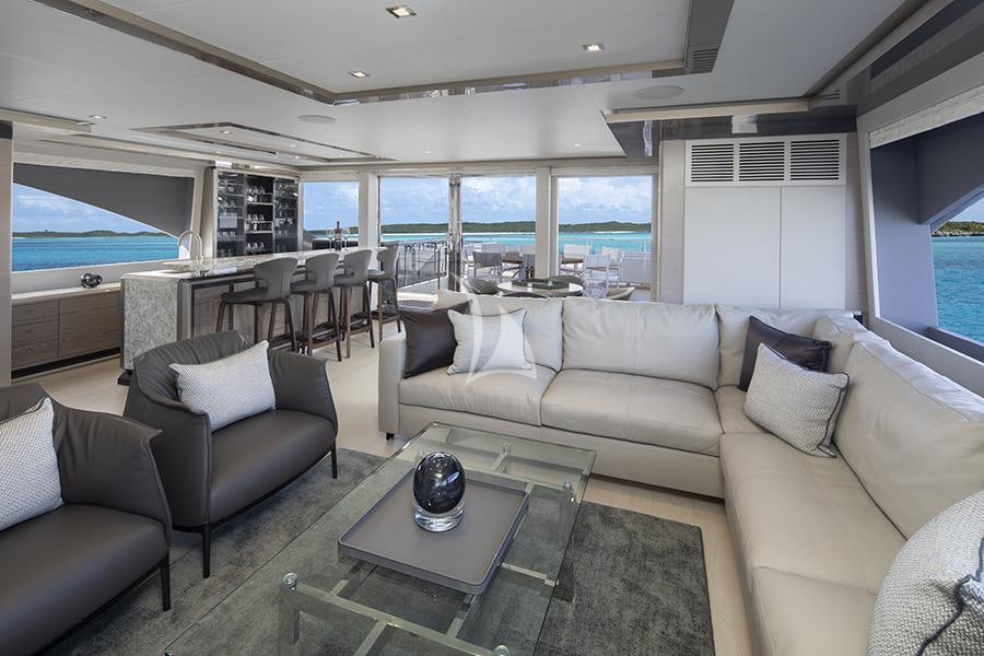 a living room with a large window aboard ENTREPRENEUR Yacht for Charter