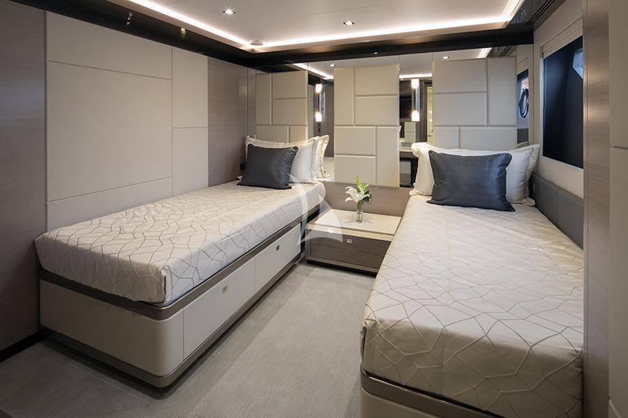 a room with two beds aboard ENTREPRENEUR Yacht for Charter