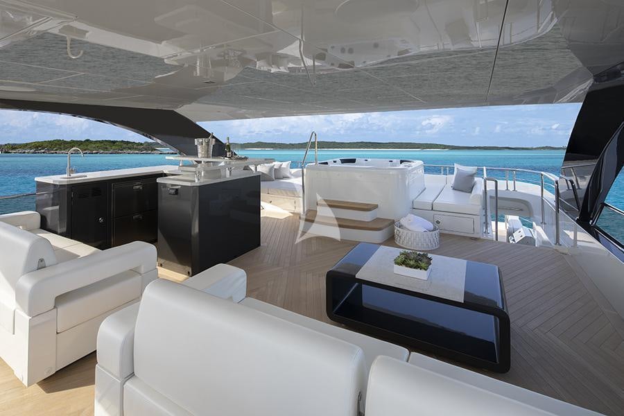 a large living room with a pool aboard ENTREPRENEUR Yacht for Charter