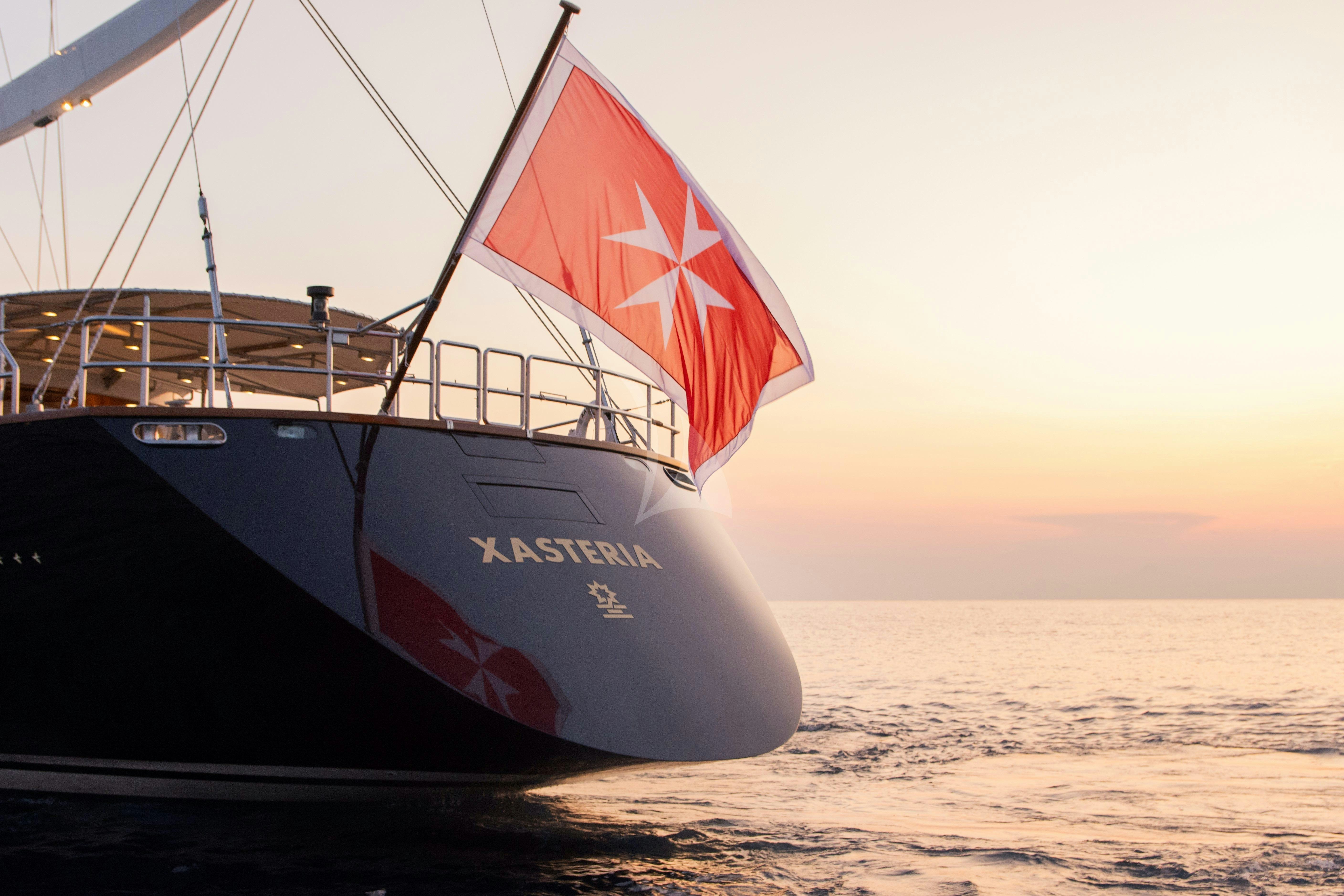 a large ship in the water aboard XASTERIA Yacht for Charter