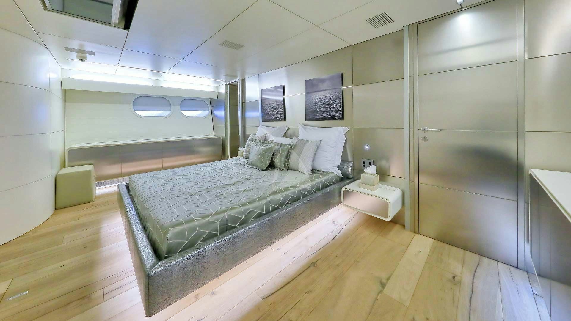 a bed in a room aboard ANAVI Yacht for Charter