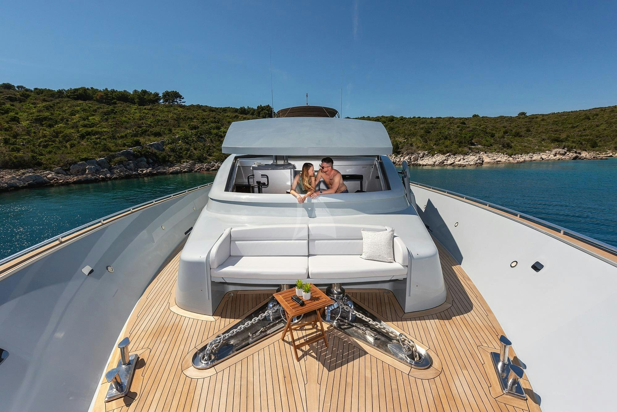 a boat on a water body aboard ANAVI Yacht for Charter