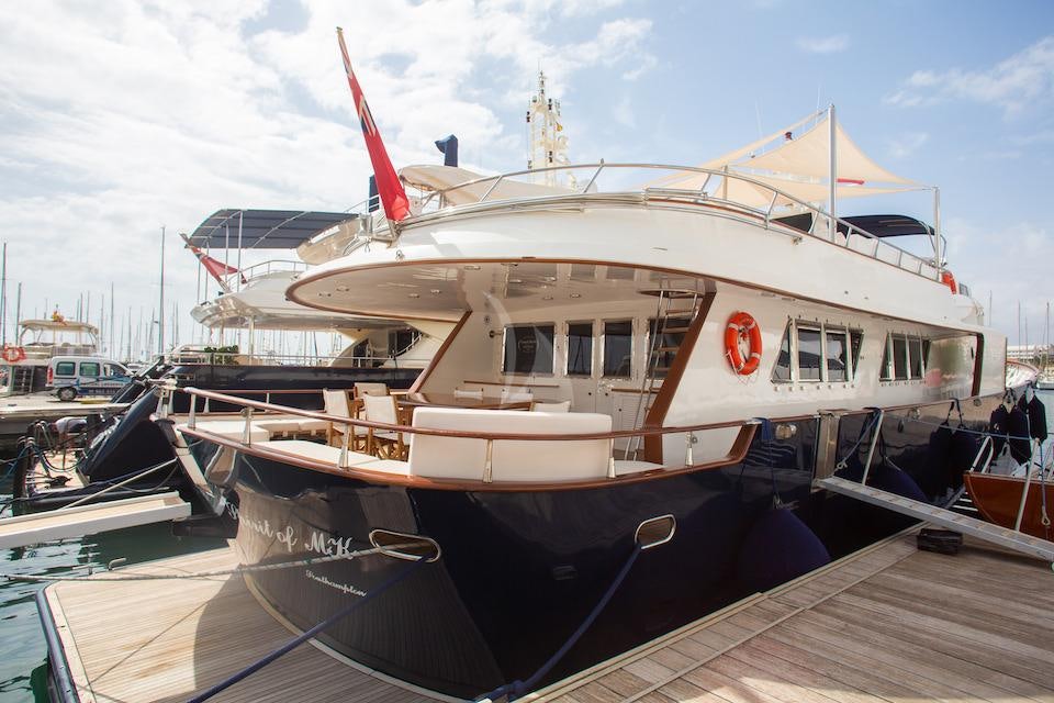 a boat docked at a pier aboard SPIRIT OF MK Yacht for Charter