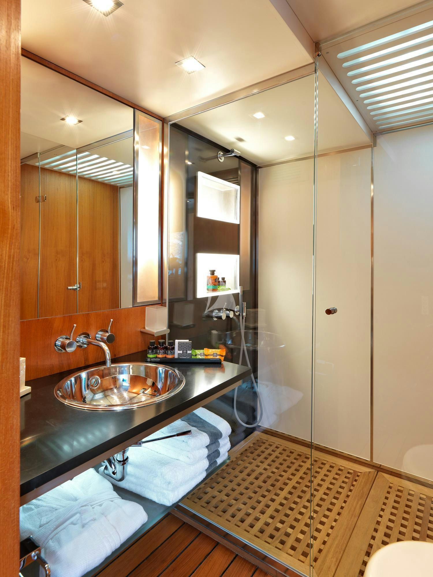 a bathroom with a sink and a bathtub aboard SOUNION II Yacht for Charter