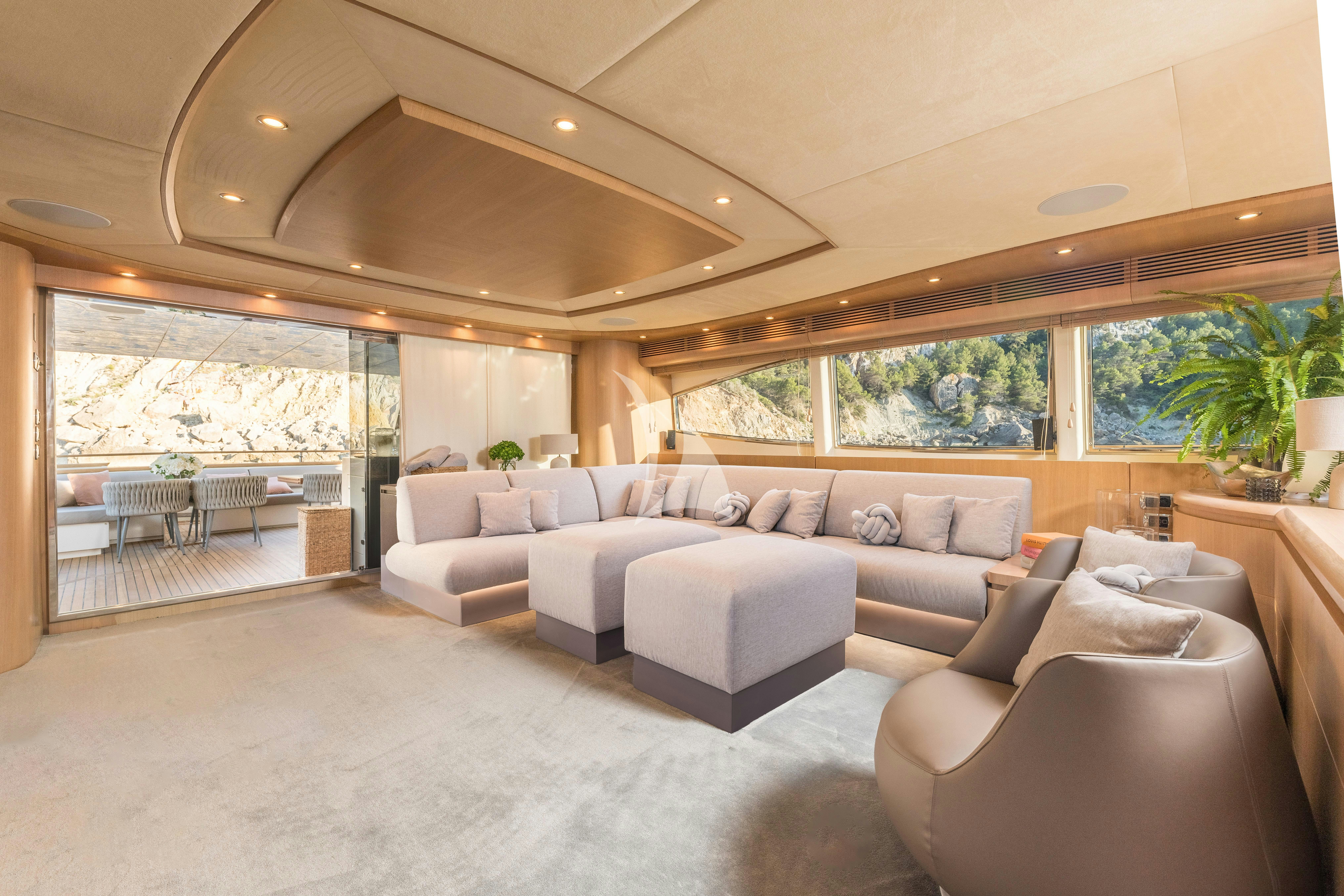 a living room with a large window aboard B4 Yacht for Charter