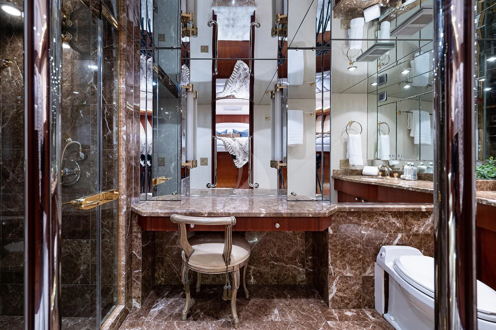 a bathroom with a sink and toilet aboard MAGNUM RIDE Yacht for Charter