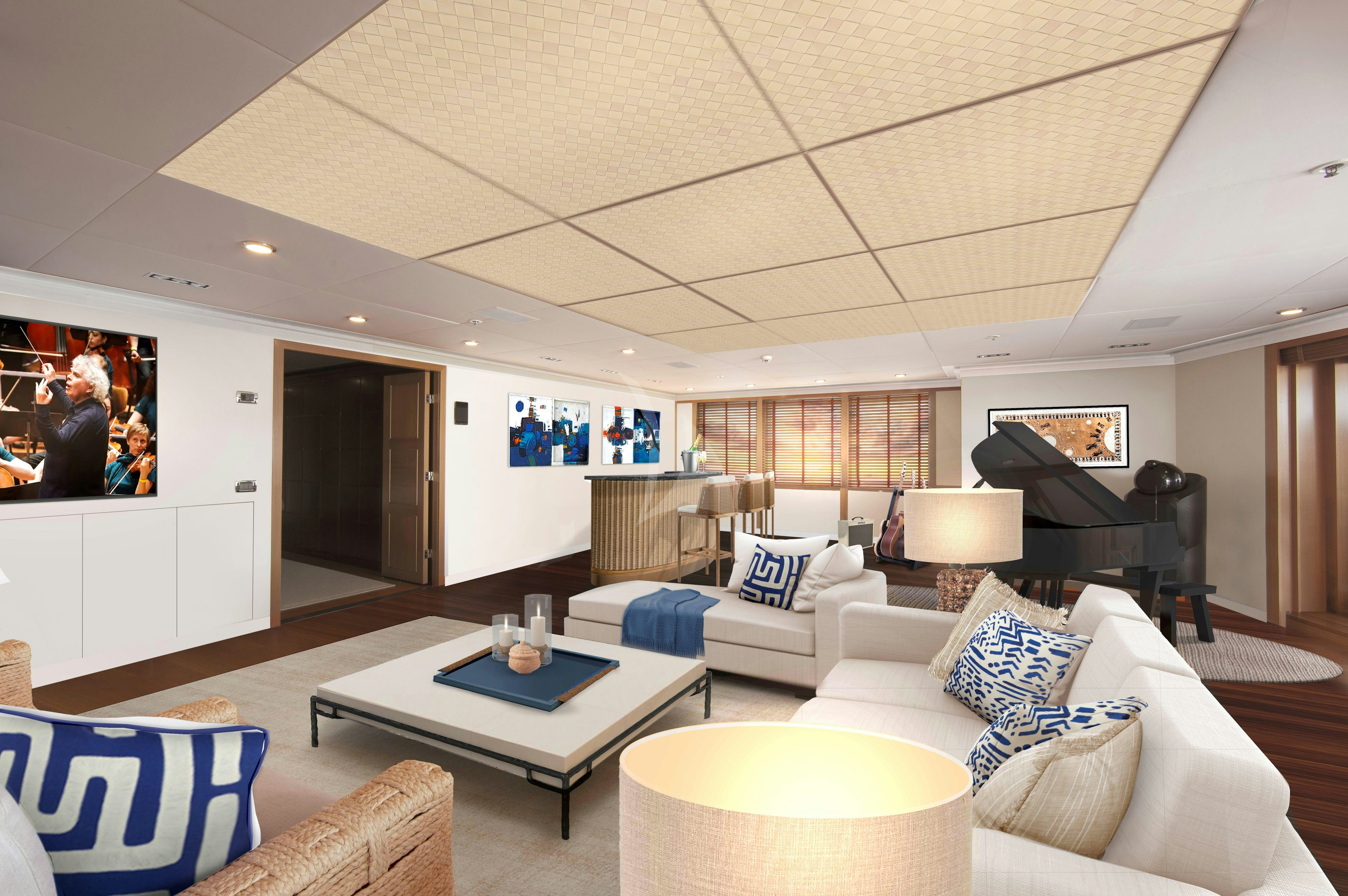a living room with a large screen aboard HBC Yacht for Charter