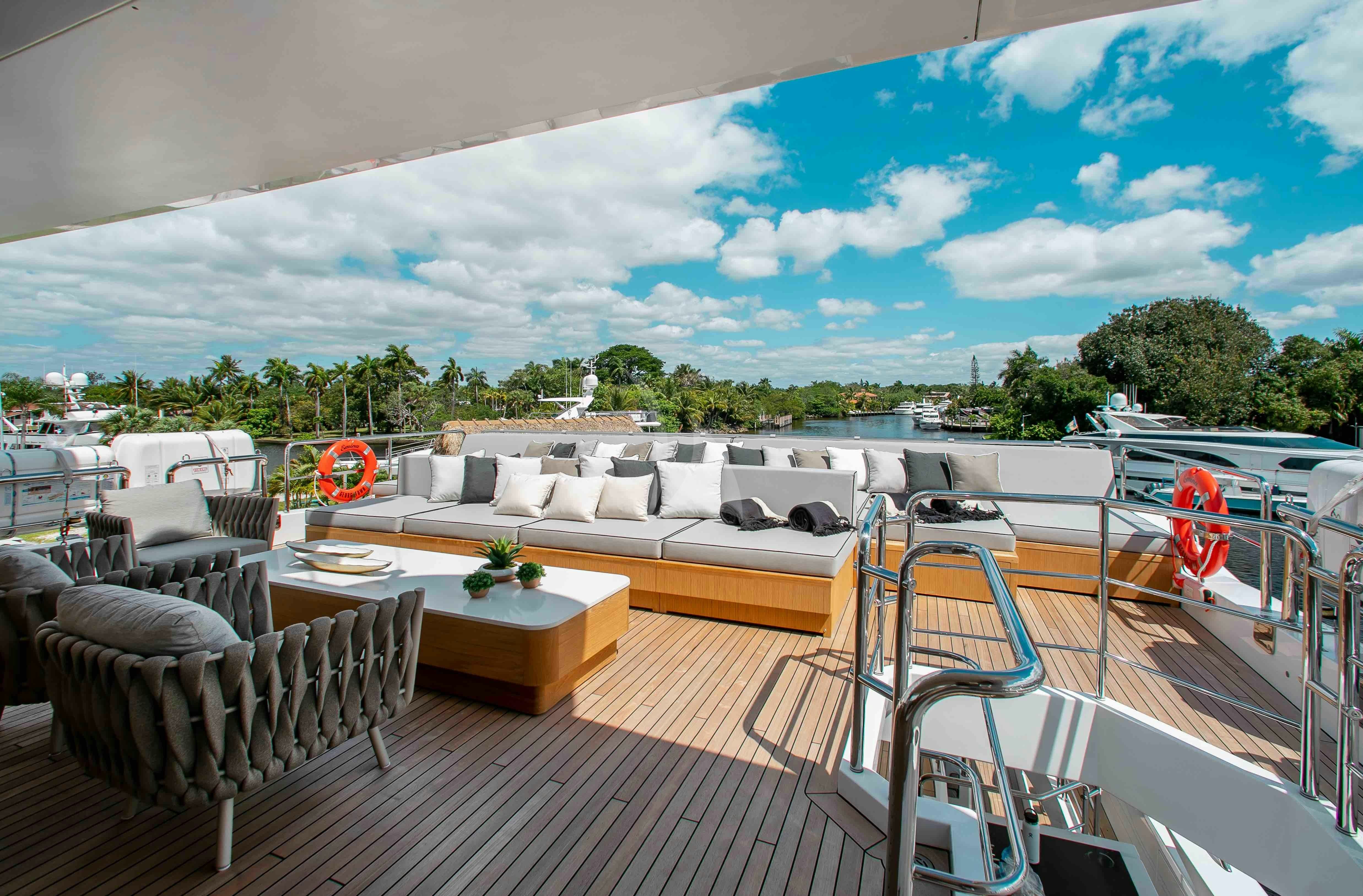 a deck with a large pool aboard EMINA Yacht for Charter