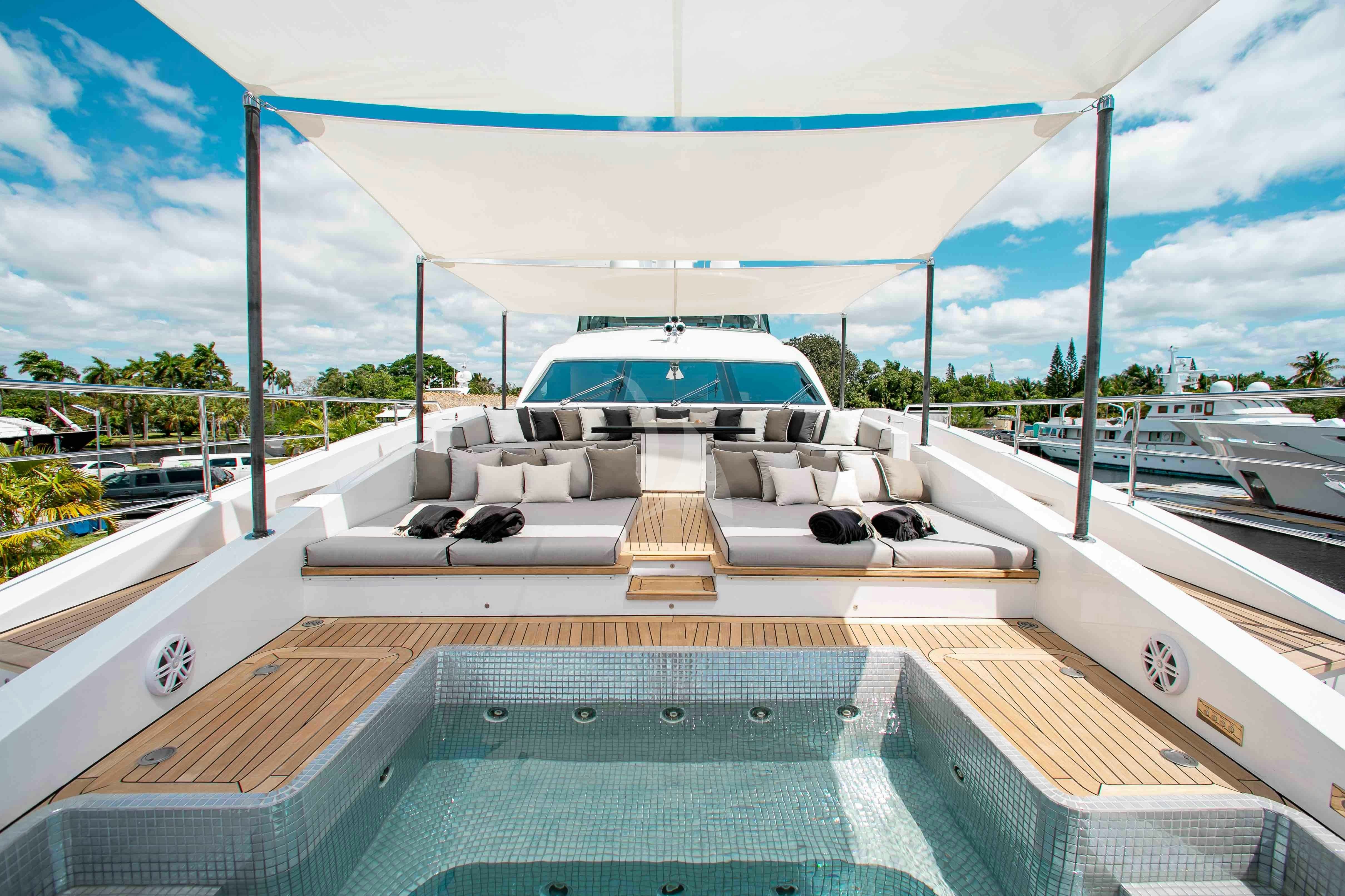 a deck with a boat on it aboard EMINA Yacht for Charter