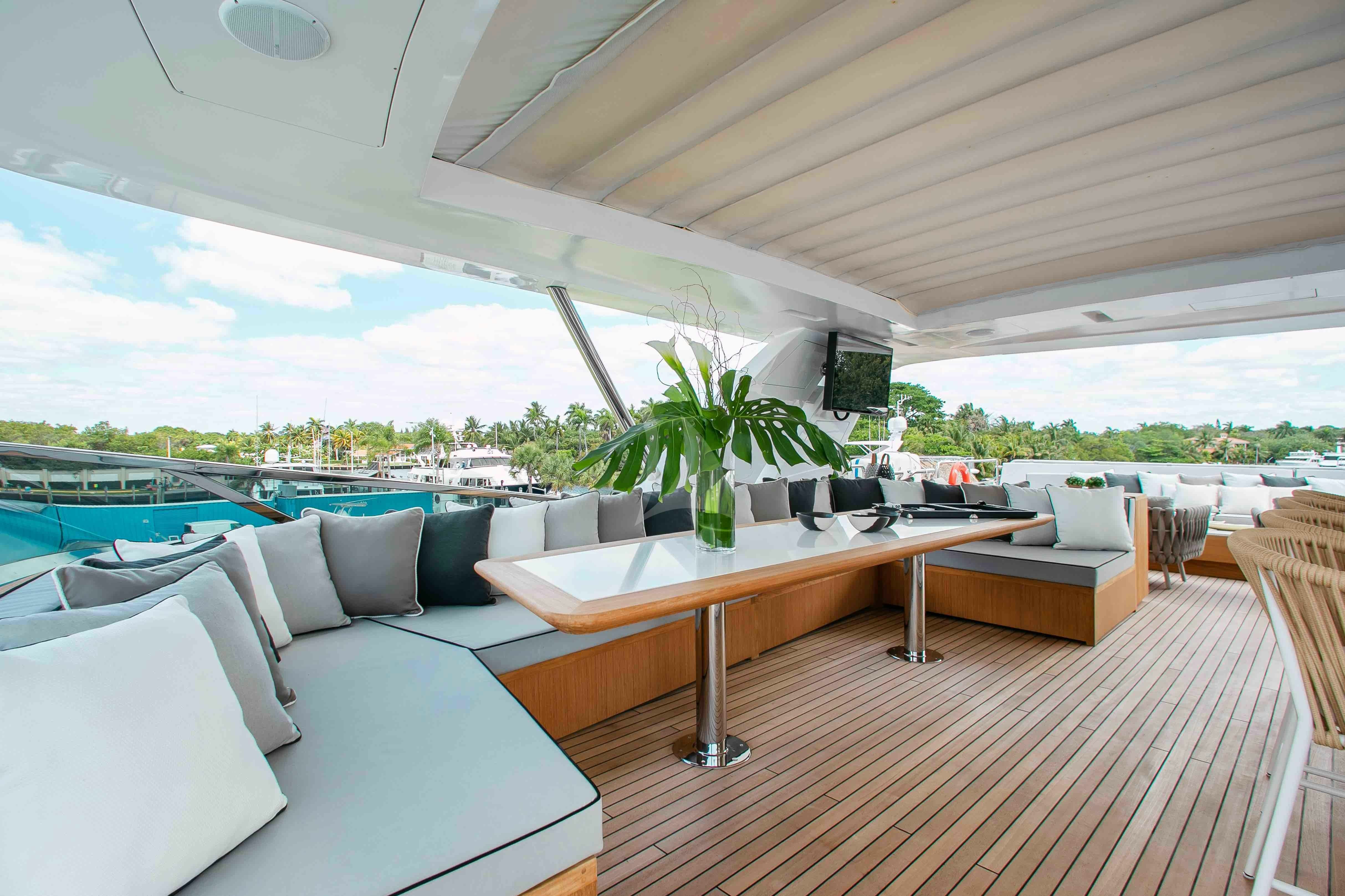 a room with a table and chairs aboard EMINA Yacht for Charter