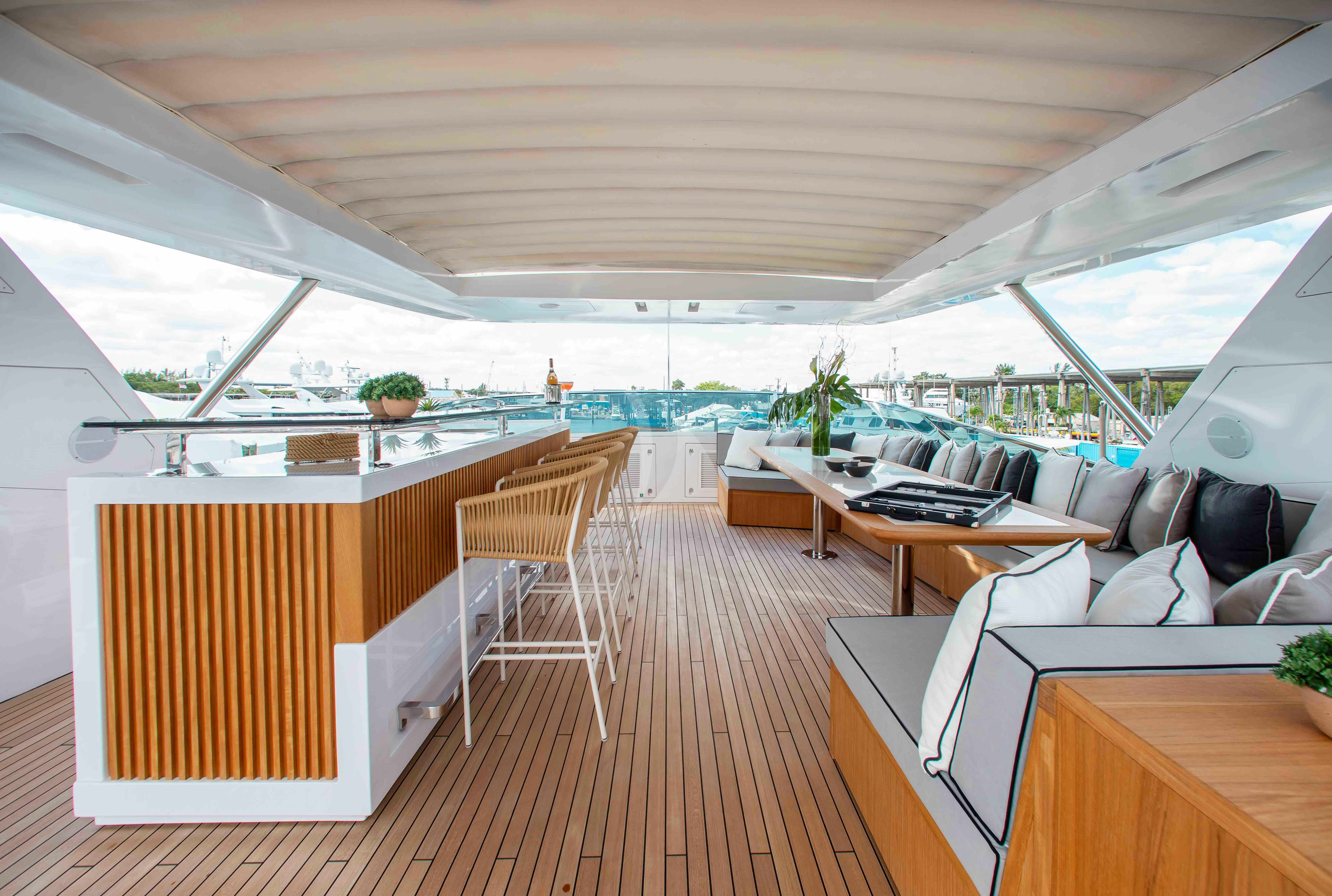 a room with a table and chairs aboard EMINA Yacht for Charter