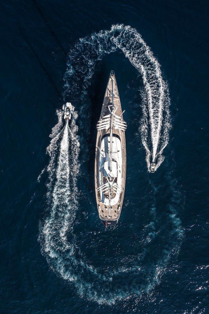 a rocket with a lot of smoke coming out of it aboard ZENJI Yacht for Charter