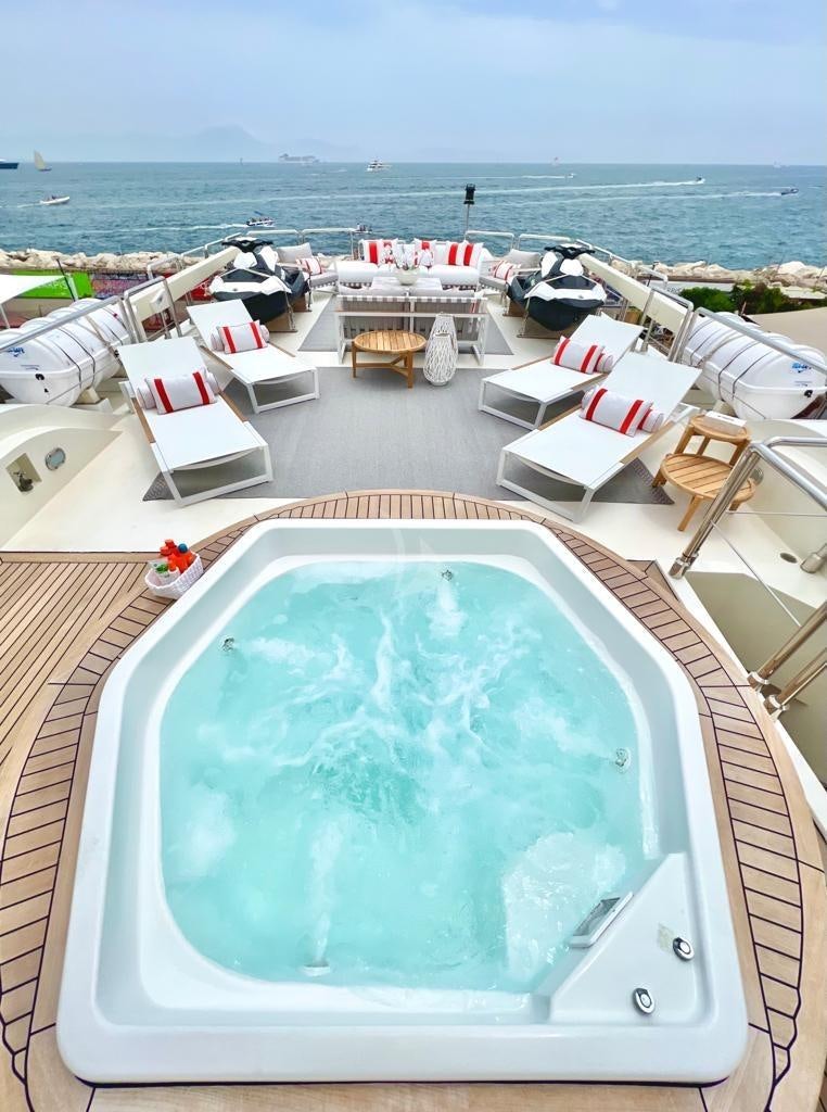 a pool on a deck overlooking the ocean aboard SOLAFIDE Yacht for Charter
