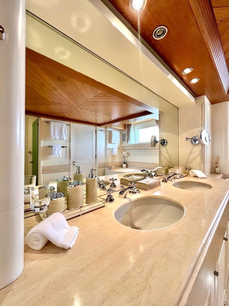 a bathroom with a large mirror aboard SOLAFIDE Yacht for Charter