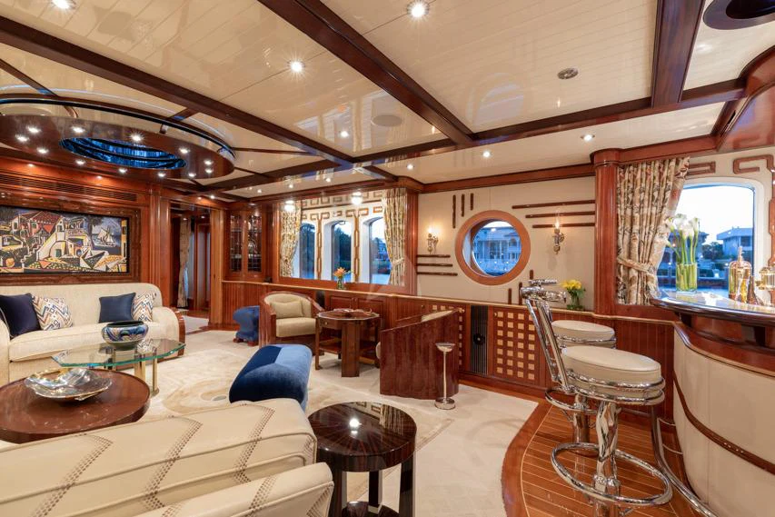 a living room with a large mirror aboard NADAN Yacht for Charter
