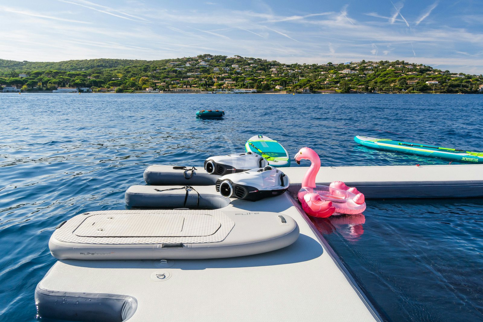 a pink toy boat on a lake aboard S7 Yacht for Charter