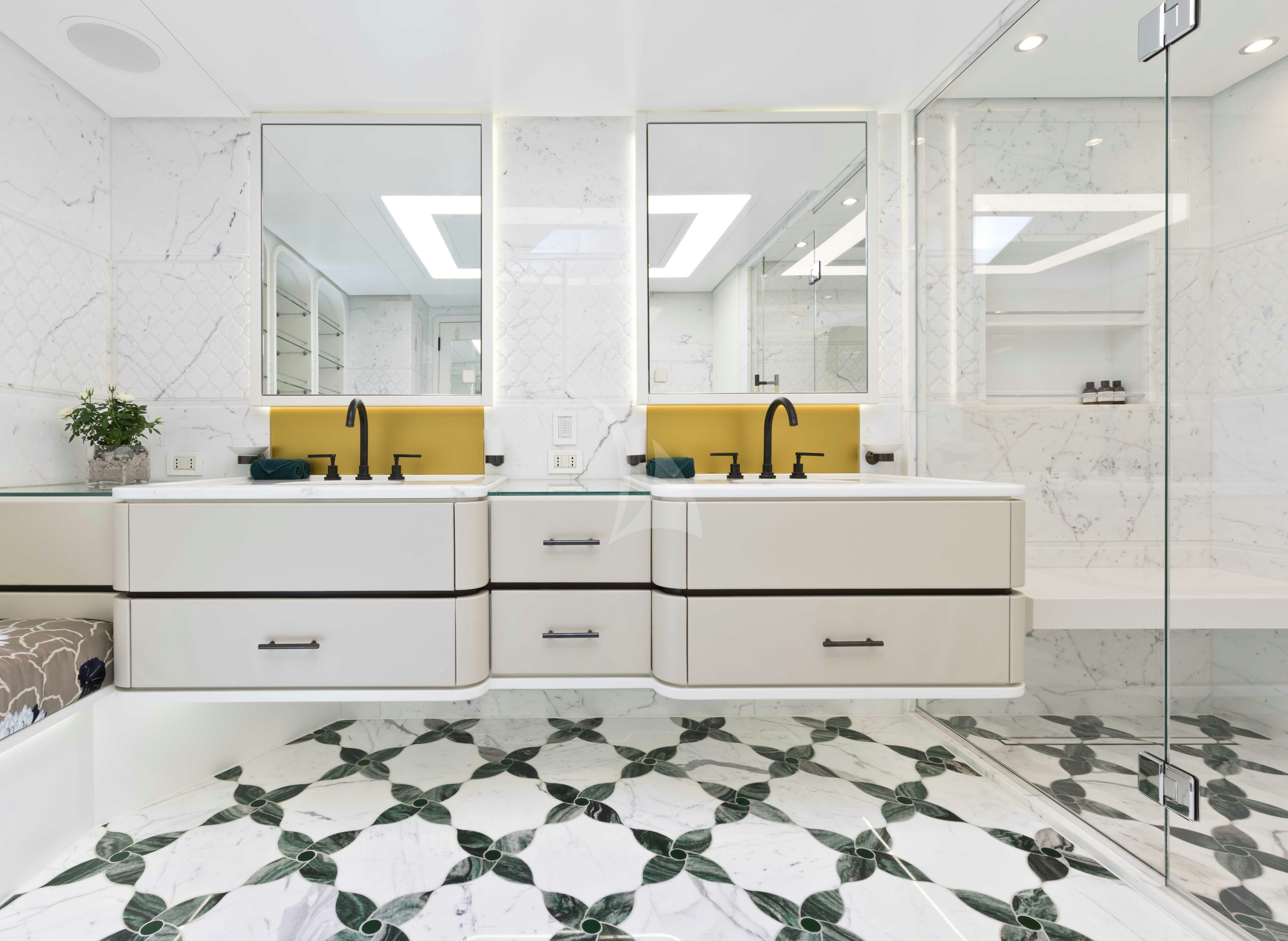a bathroom with white cabinets aboard KHALILAH Yacht for Charter