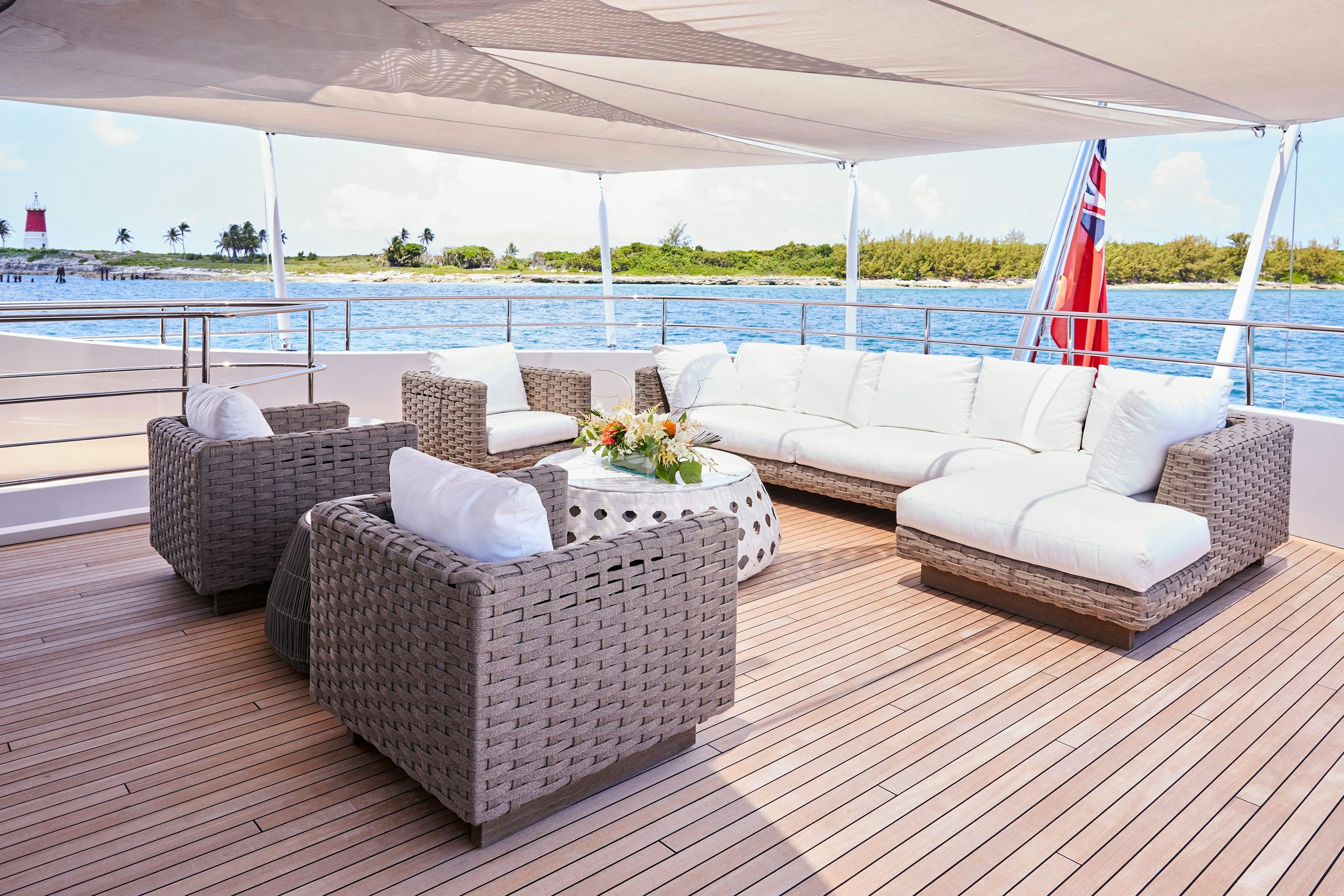 a patio with couches and chairs aboard ARKADIA Yacht for Charter