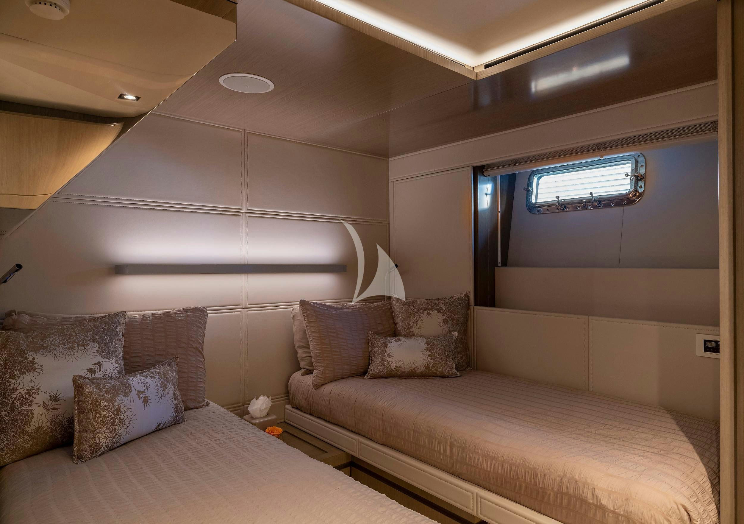 a bed in a room aboard THE PEDDLER Yacht for Sale