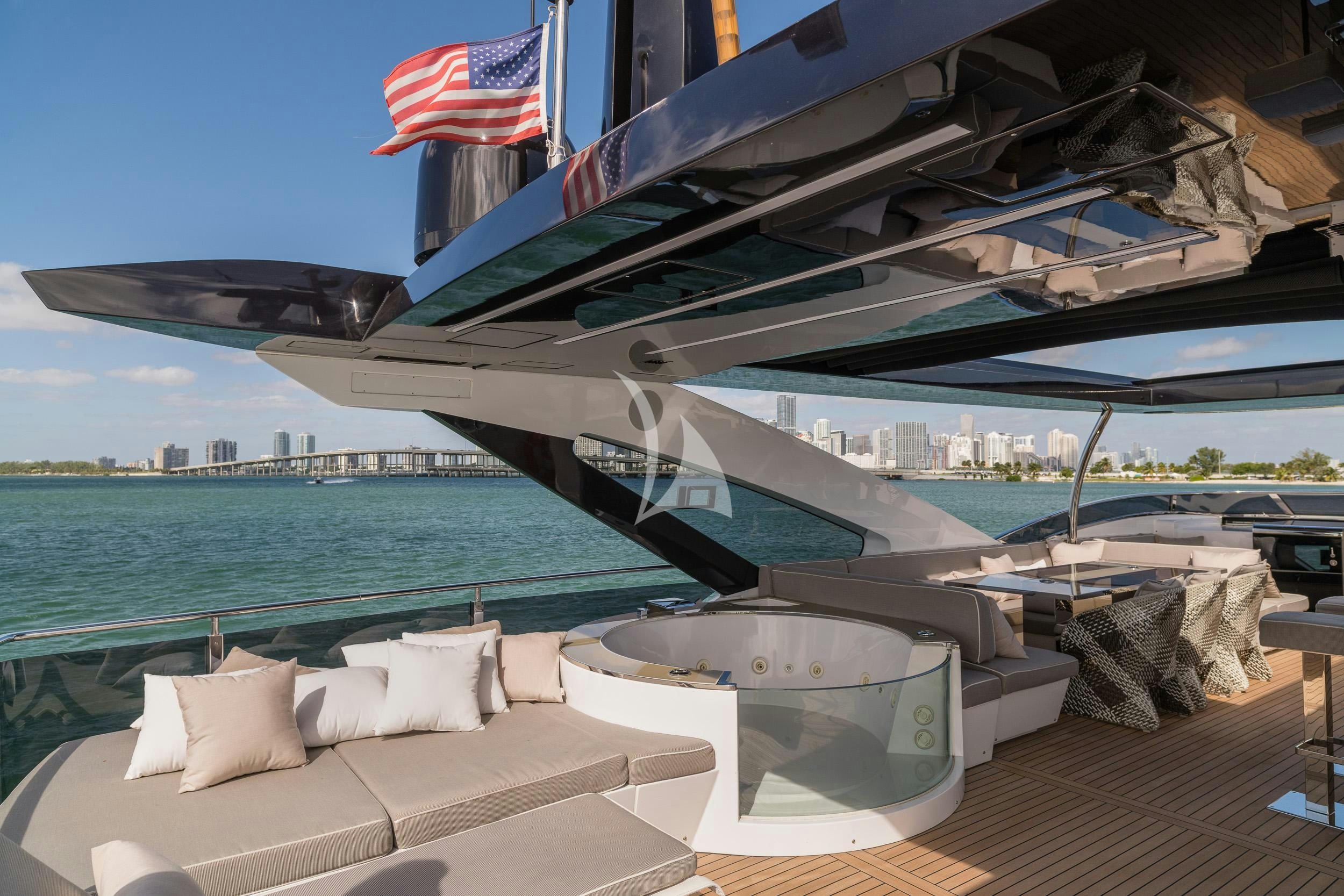 a boat with a flag on the front aboard THE PEDDLER Yacht for Sale
