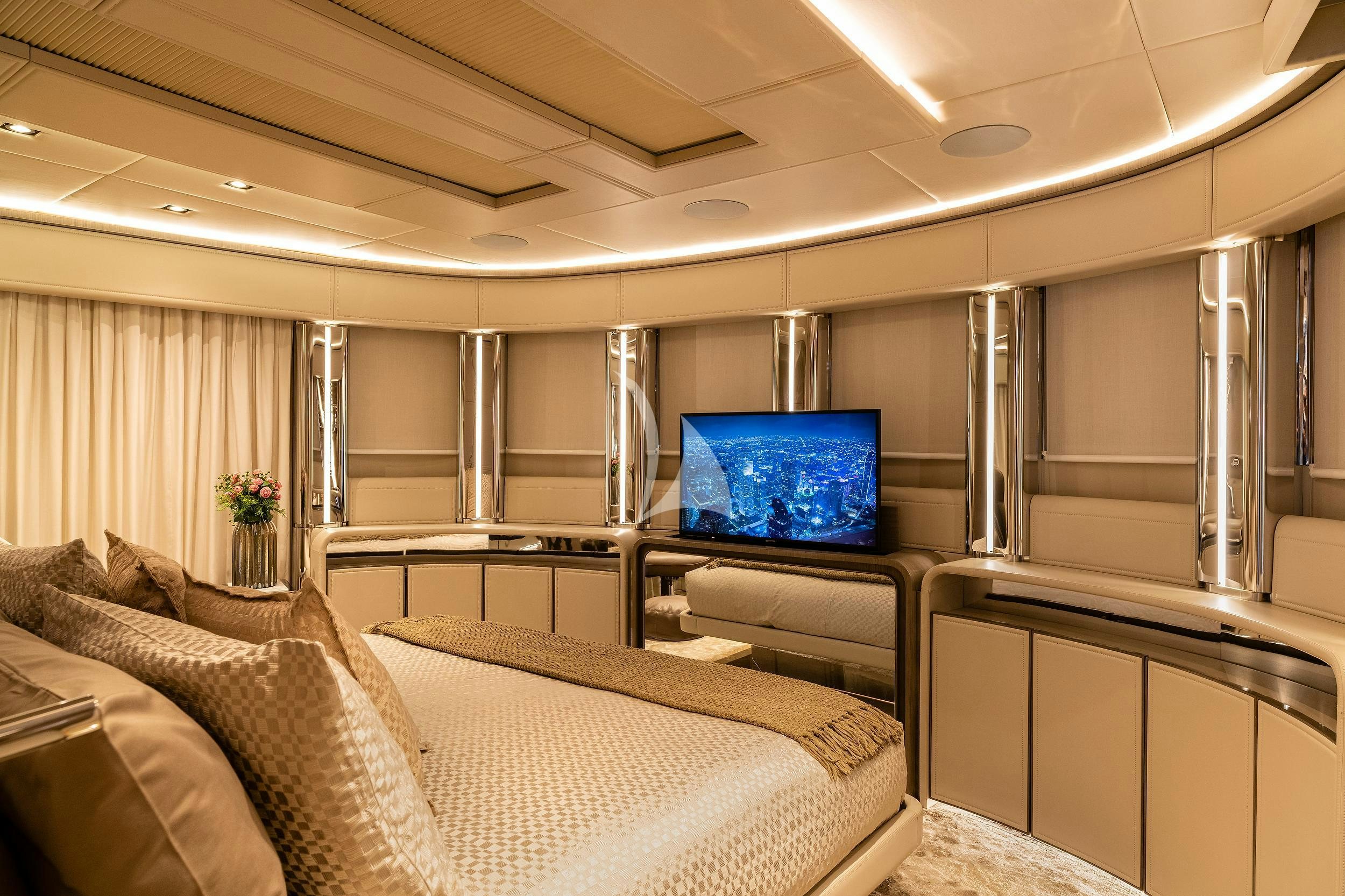 a room with a bed and a tv aboard THE PEDDLER Yacht for Sale