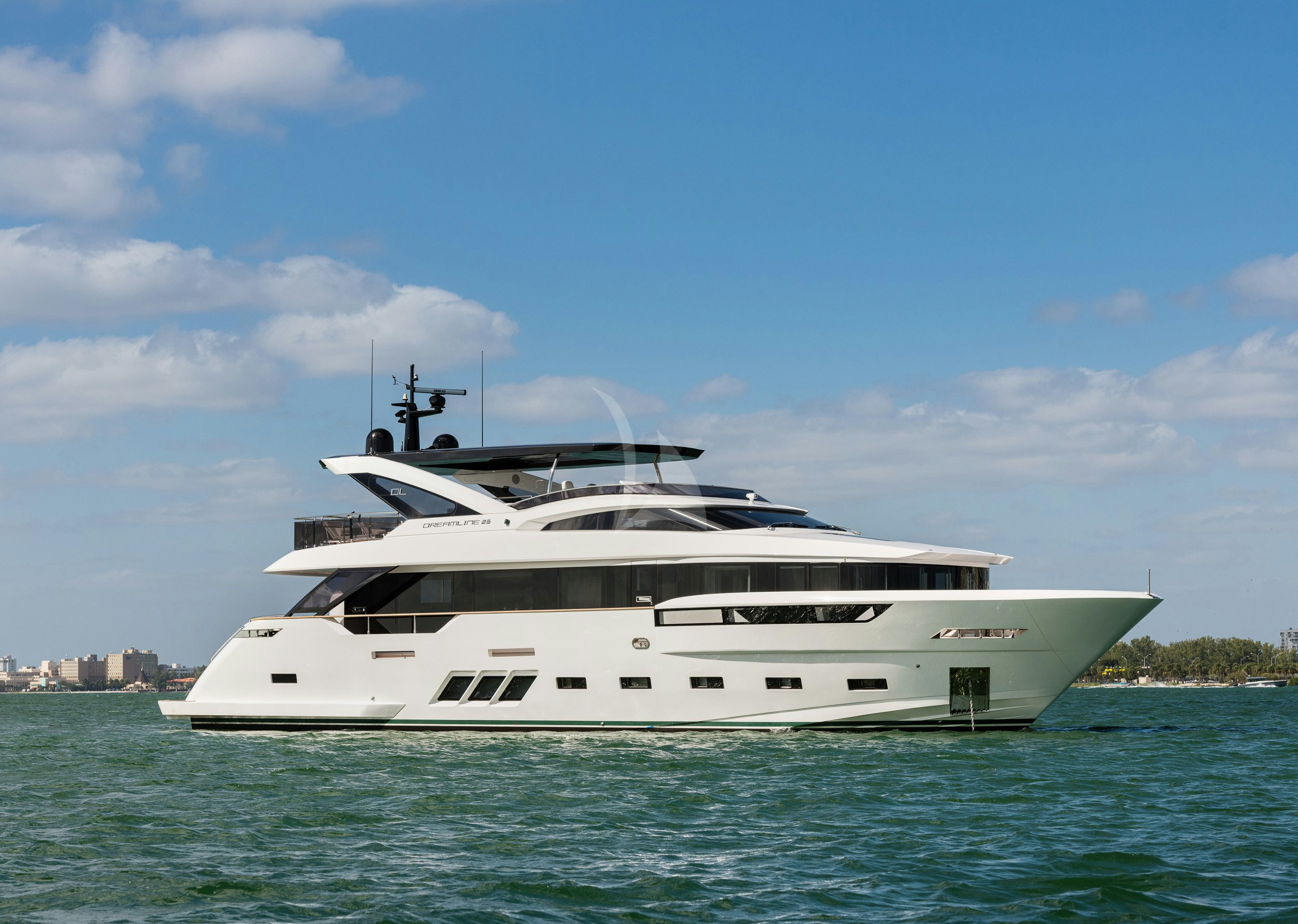 a white yacht in the water aboard THE PEDDLER Yacht for Sale