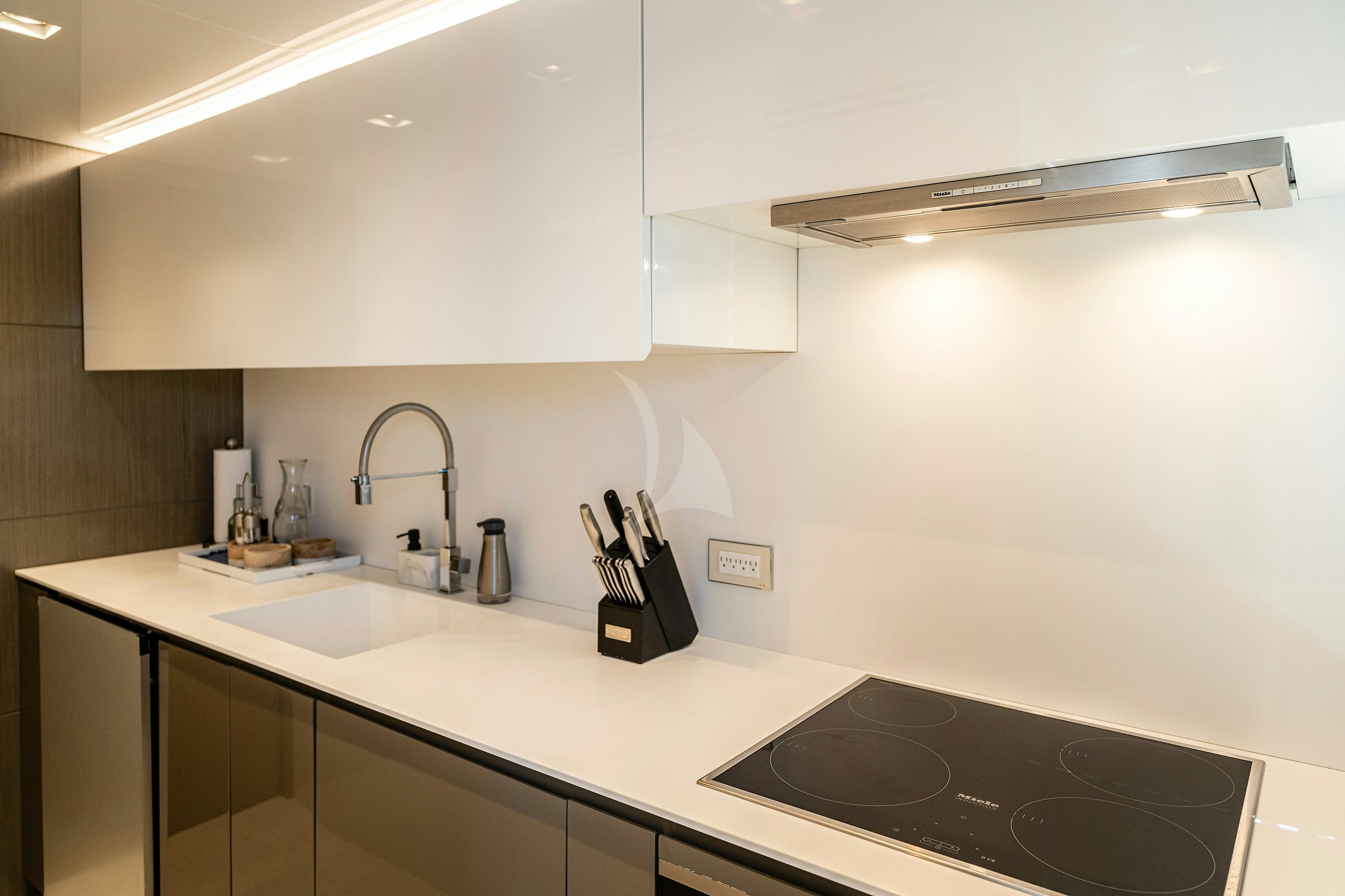 a kitchen with a sink and stove aboard THE PEDDLER Yacht for Sale