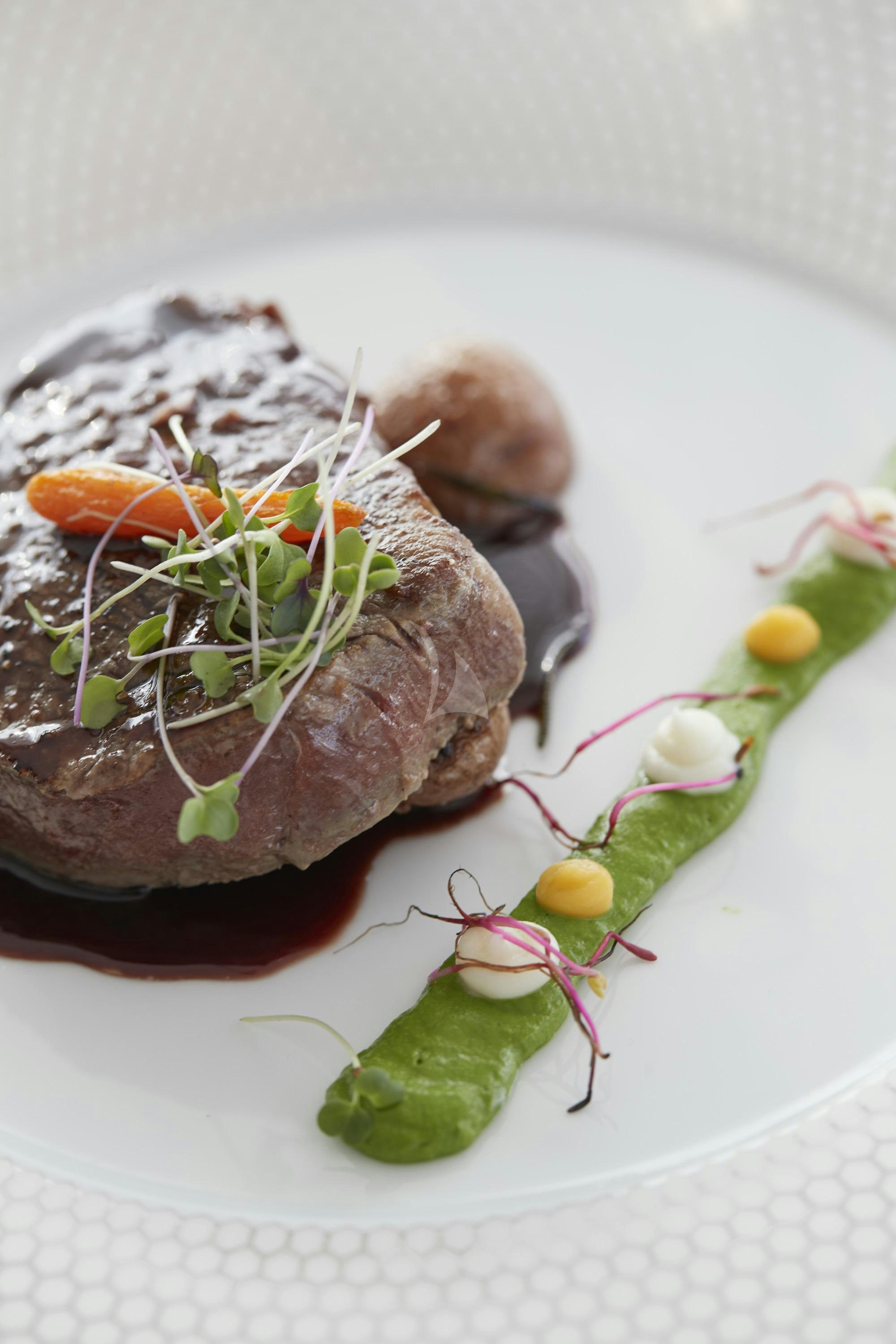 a plate of food aboard ALEGRE Yacht for Charter