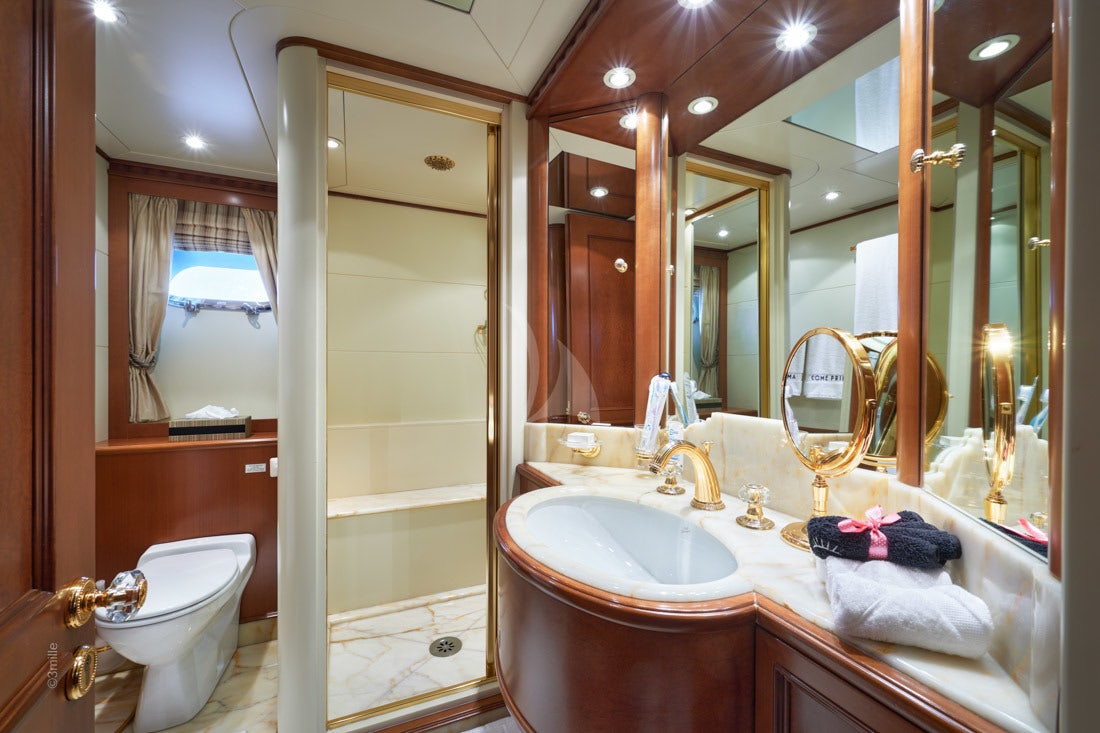 a bathroom with a large shower aboard COME PRIMA Yacht for Charter