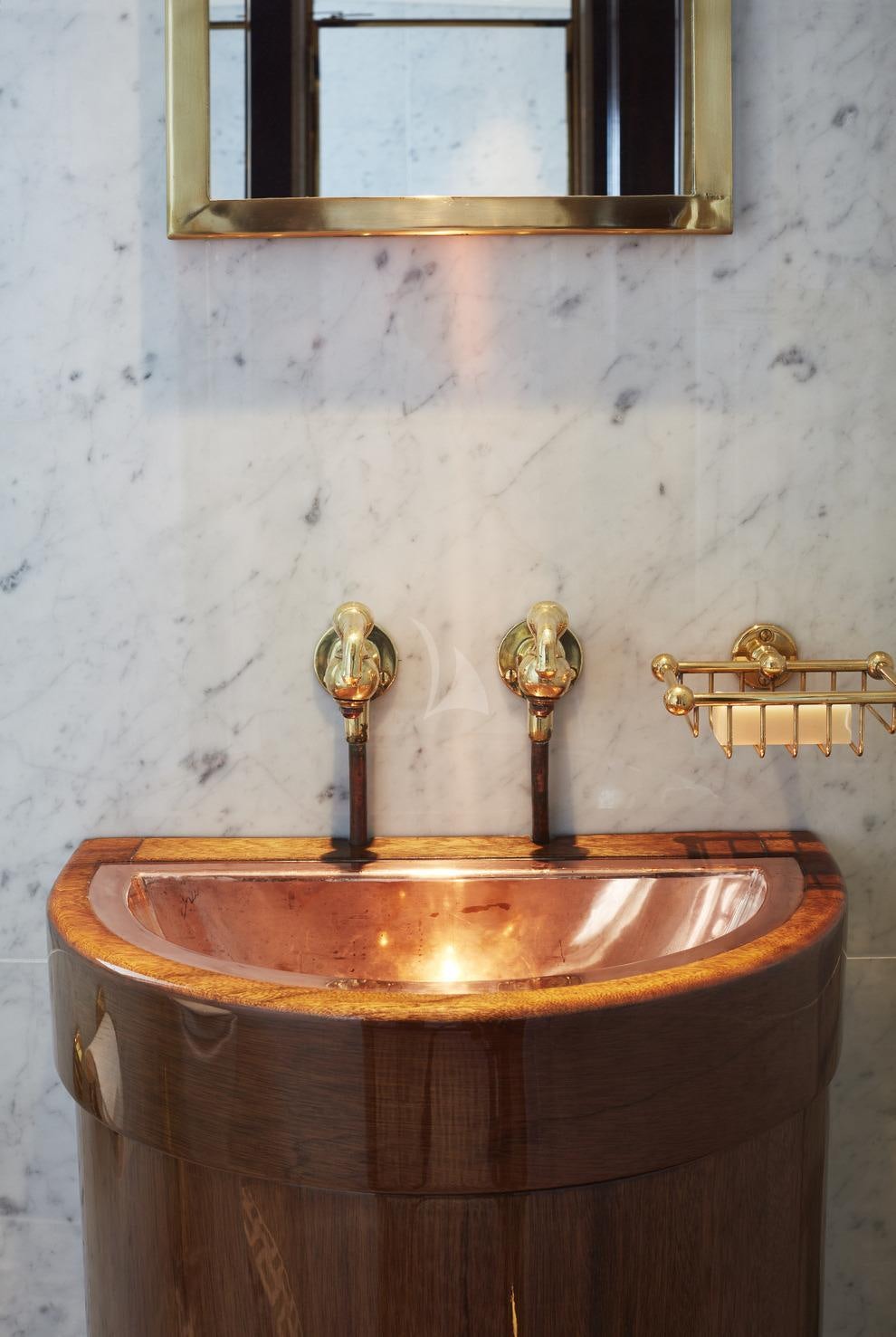 a sink in a room aboard MARALA Yacht for Charter